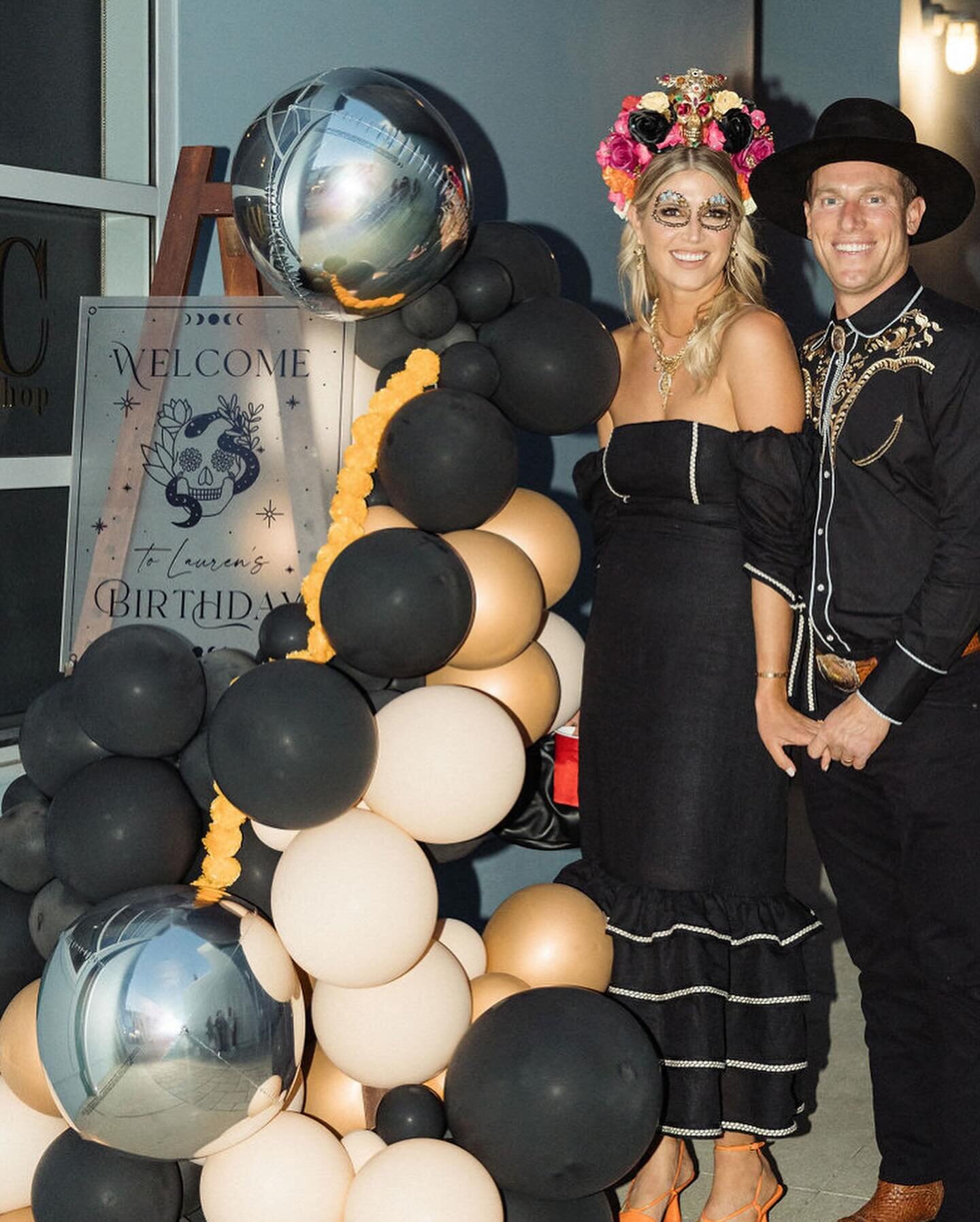 The most beautiful Day of the Dead / Dia de los Muertos party you ever did see!  The colors and details are so vibrant, mixed with black and frosted acrylic signage 🖤🧡🌼🌸

Vendors - Design &amp; Planning - @beijosevents / Photographer - @blairegoi