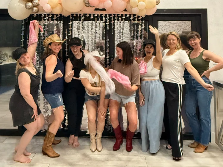 A bachelorette party on stage after an Austin honky-tonk line dance lesson