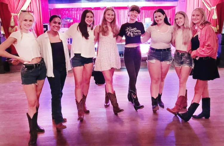 A bachelorette crew at an Austin line dance lesson