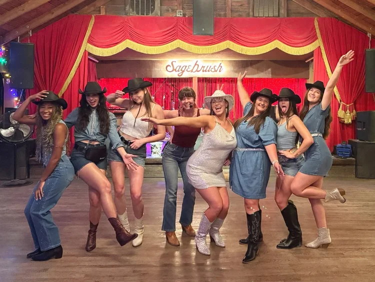 Bachelorette party in cowboy hats on the Sagebrush stage in South Austin