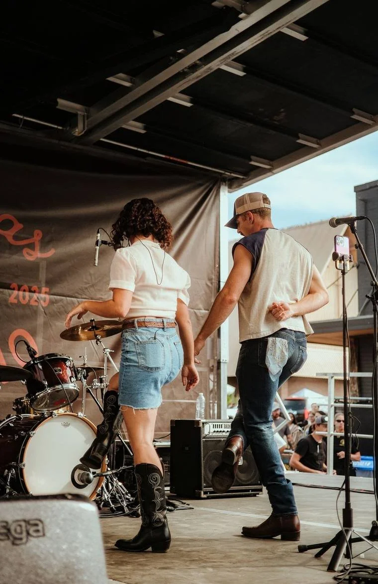 Double or Nothing dancers performing at the Tecovas block party in Austin