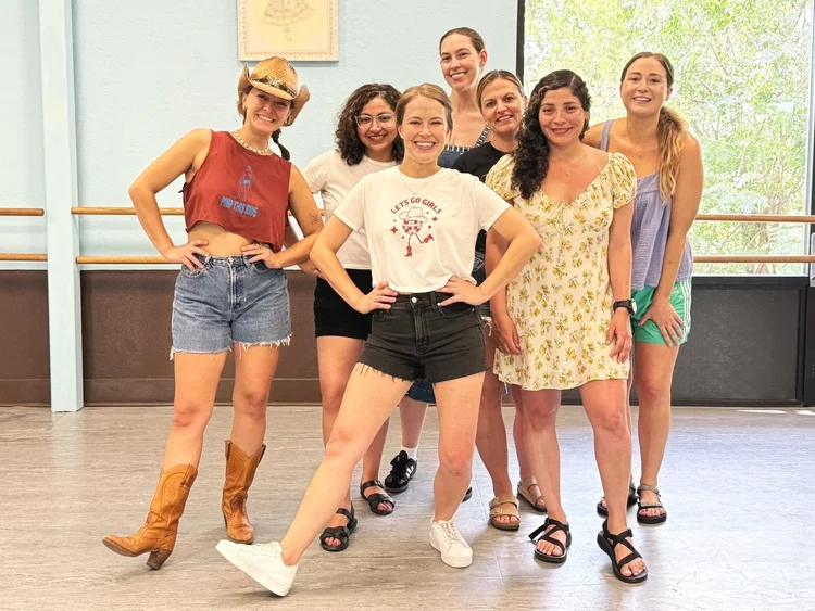 A bachelorette group celebrating a line dance lesson at an Austin honky-tonk