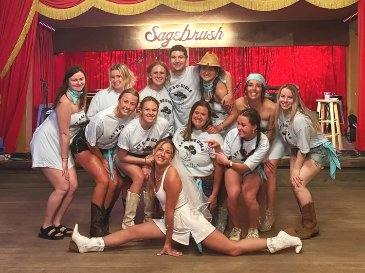 A bachelorette party learning to line dance with Double or Nothing in Austin
