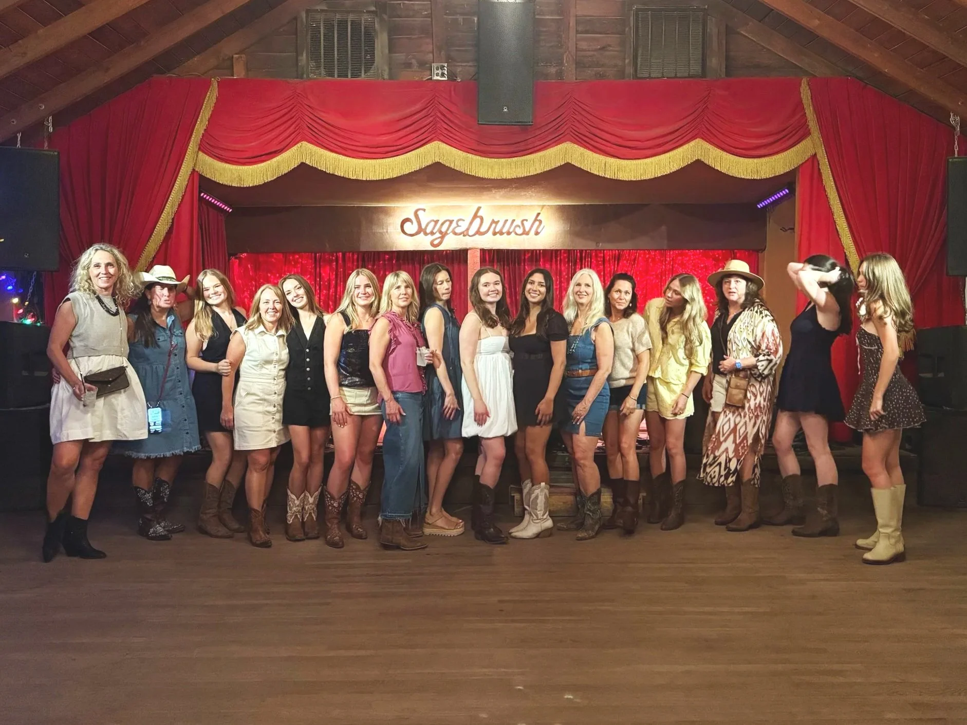 Wedding guests learning a group line dance at an Austin reception