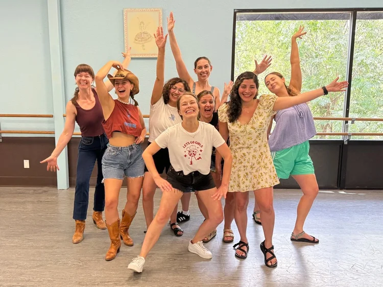 A bachelorette party learning to line dance with Double or Nothing in Austin