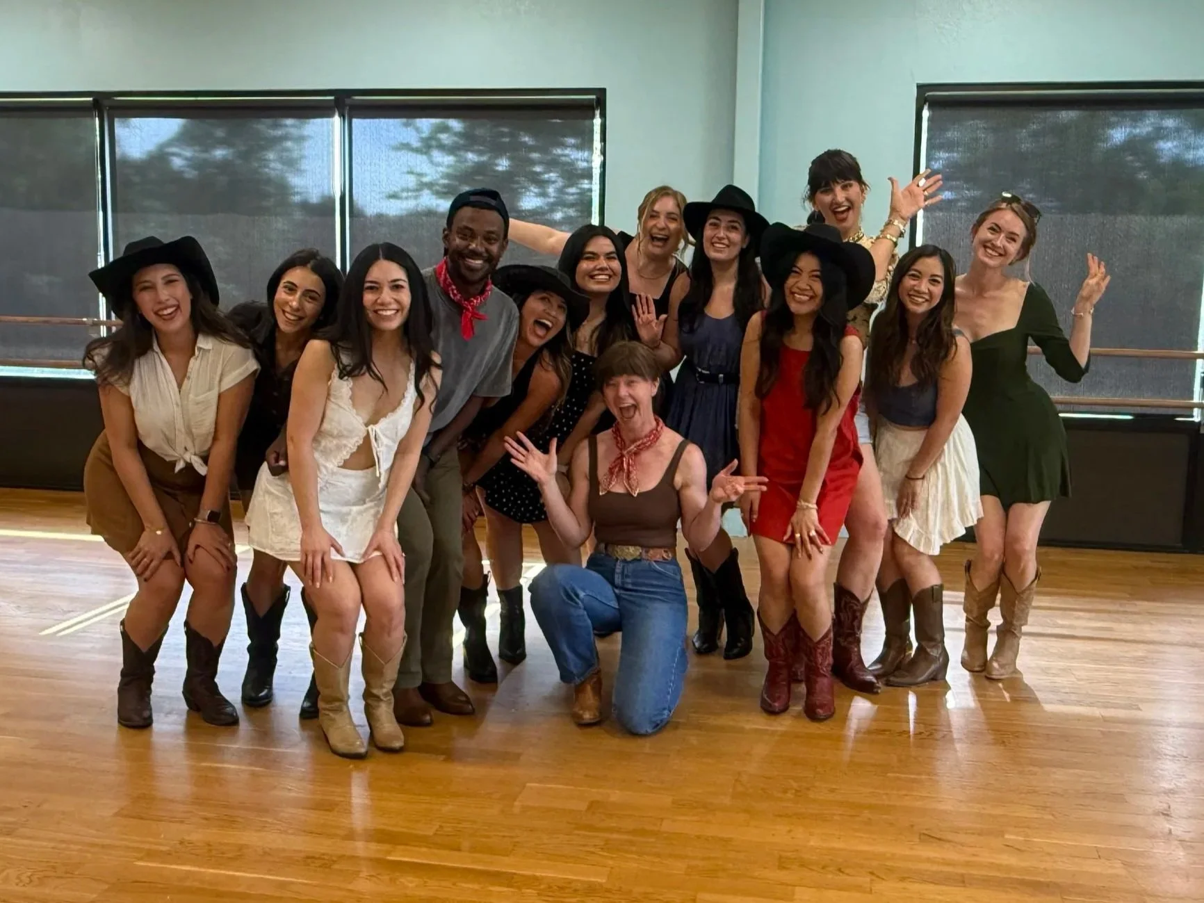 Group of women learning line dancing at authentic Austin honky-tonk for bachelorette weekend