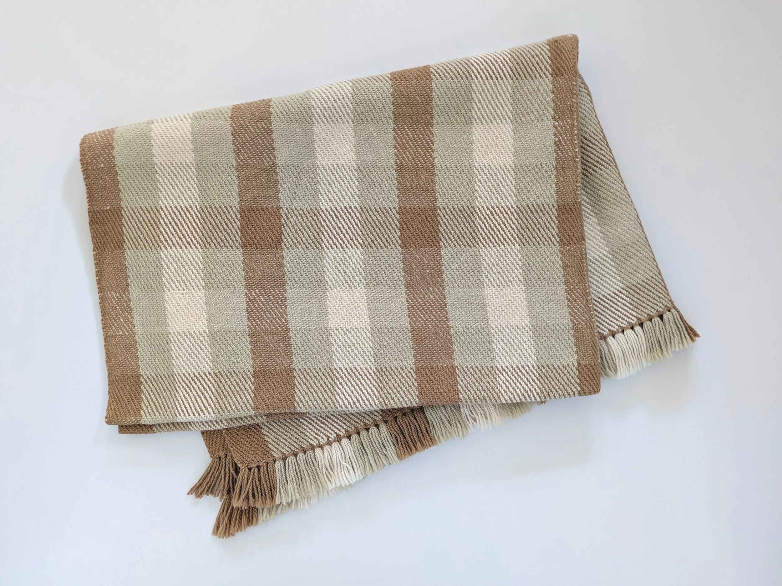 Untitled, 2026. Naturally colored cotton blanket.