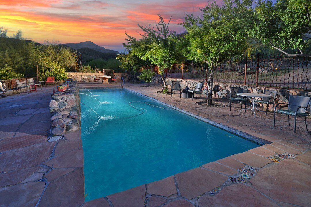 A true desert oasis here at Aravaipa Farms. Nothing beats the feeling of a dip in cool water on a warm day! Now add a few citrus trees overhead, a couple water fountains, and some pool floaties and you&rsquo;ve got yourself one awesome place for happ