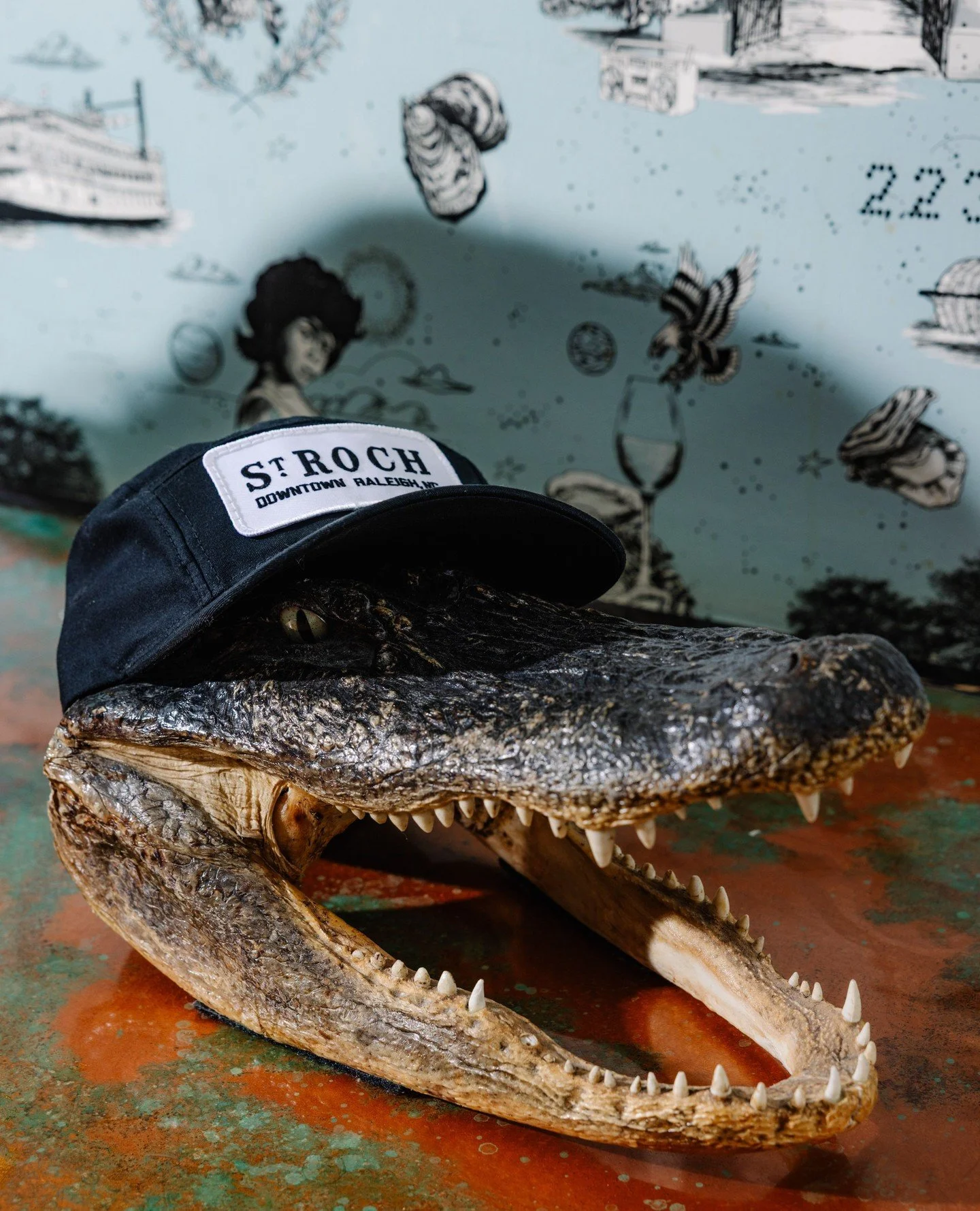 Sink your teeth into a St Roch hat before they're gone!  Purchase at the restaurant, or email heather@strochraleigh.com. 🐊
