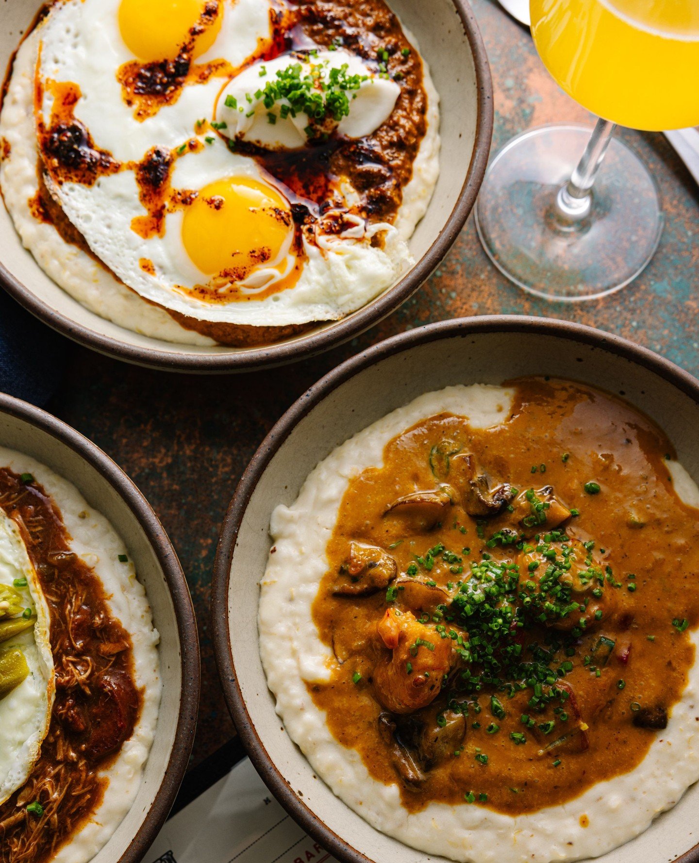We get a little saucy at brunch 🍾 🍳 Grits and mimosas are waiting for you! Book a resi using the link in our bio!⁠
⁠
#brunch #downtownraleigh #raleigheats #raleighbrunch #raleighfoodpics #raleighfoodie #cocktails #oysters #rawbar #goodeats #brunchi