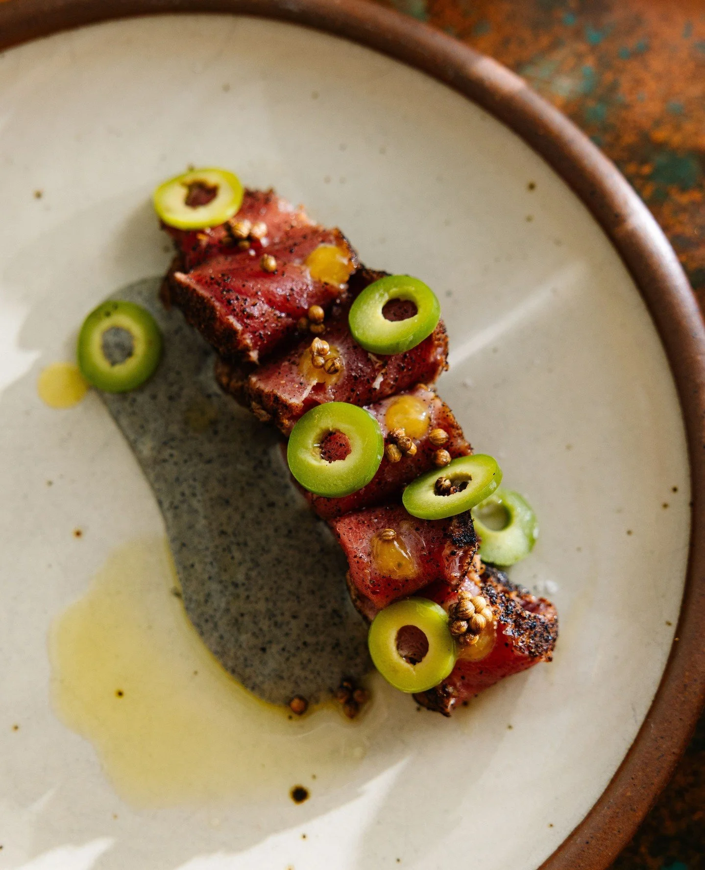 Olive for the Blackened Tuna 🐟 What&rsquo;s your favorite dish? ⁠
⁠
⁠
#oysterbar #rawbar #tuna #freshfish #olives #blackenedtuna #freshtuna #raleighdining #seafood #ncseafood #goodeats #downtownraleigh