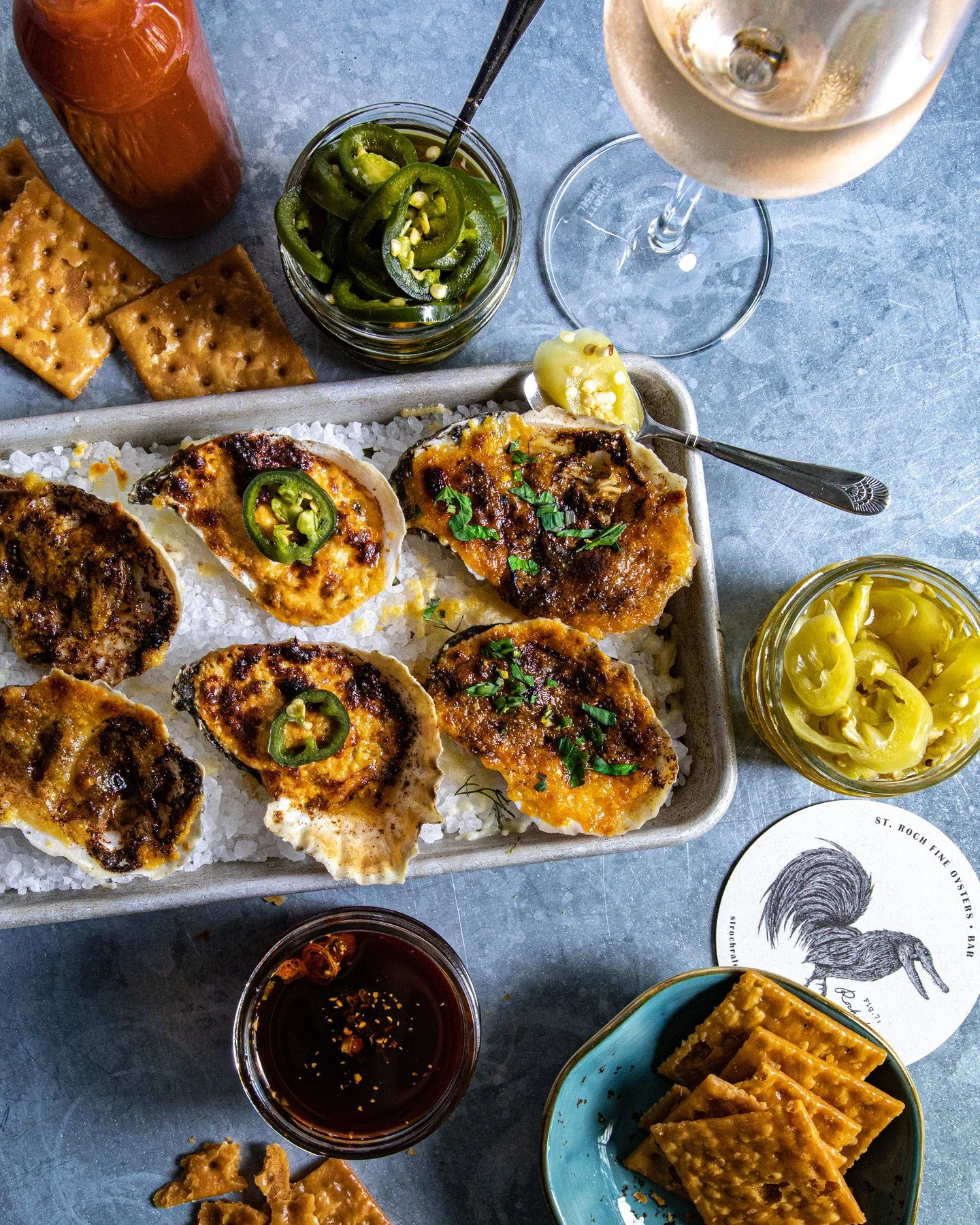 Flame roasted oysters are the way to our heart &hearts;️ Sharing some tasties is an excellent date night, hit the link in our bio to make a weekend resi!

#oysters #🦪#roastedoysters #rawbar #ncseafood #raleigheats #oystersonthehalfshell #oystershuck