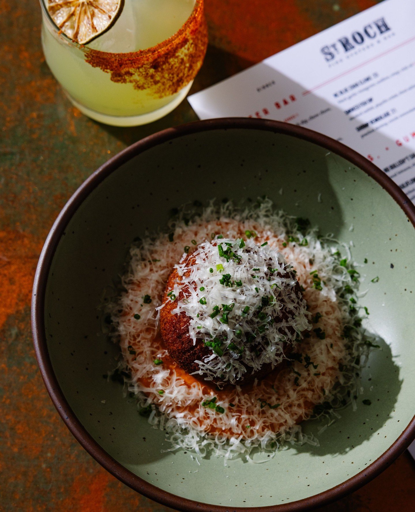 In orbit 💫 A refreshing cocktail is simply drawn to our Boudin Arancini, it&rsquo;s just science y&rsquo;all🍹 Don&rsquo;t fight gravity, use the link in our bio to book a resi!⁠
⁠
#boudin #arancini #raleigheats #foodie #raleighrestaurant #foodstagr