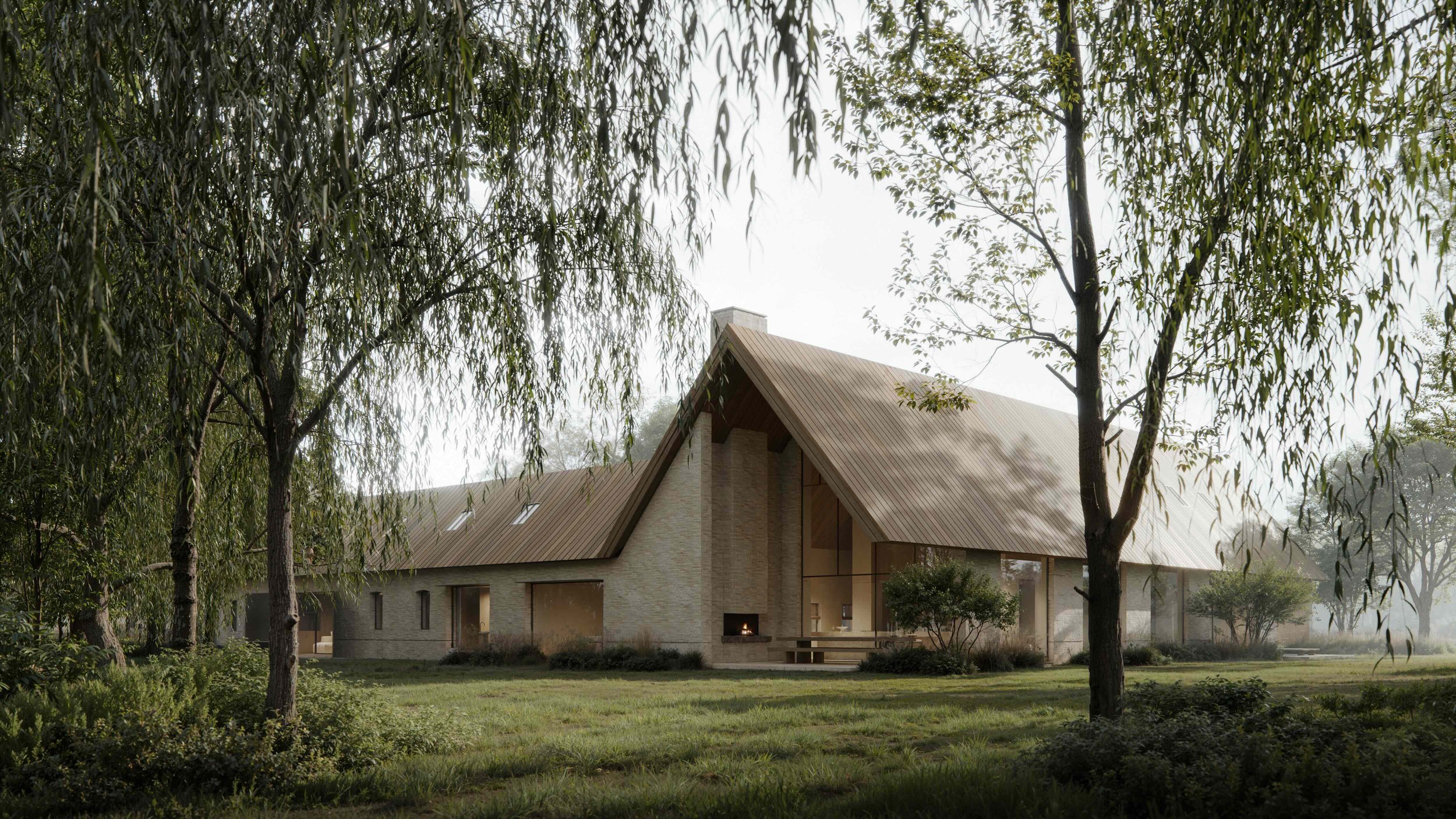 A modern house with a steep gabled roof, surrounded by trees and a grassy yard, with a chimney and a small outdoor fireplace visible.