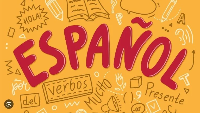 Colorful educational poster with the title 'Español' and various Spanish language words and doodles in yellow, red, and white.