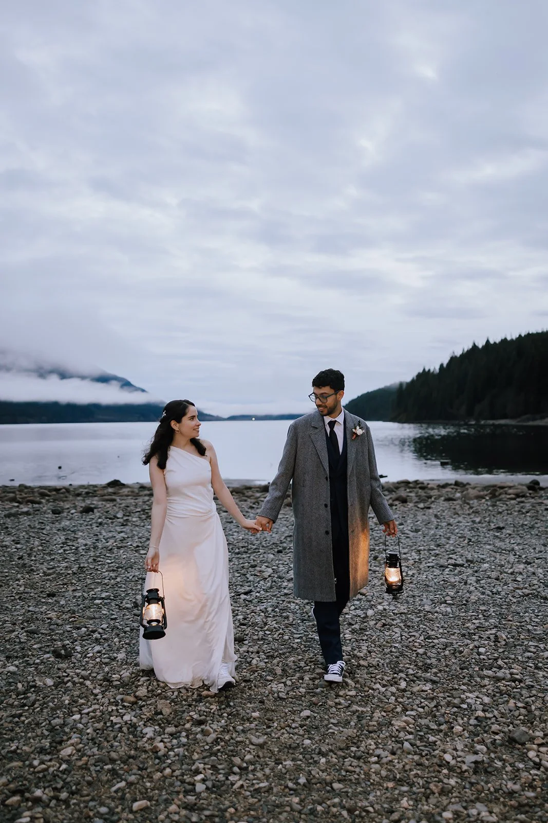 A bride and groom together at twilight