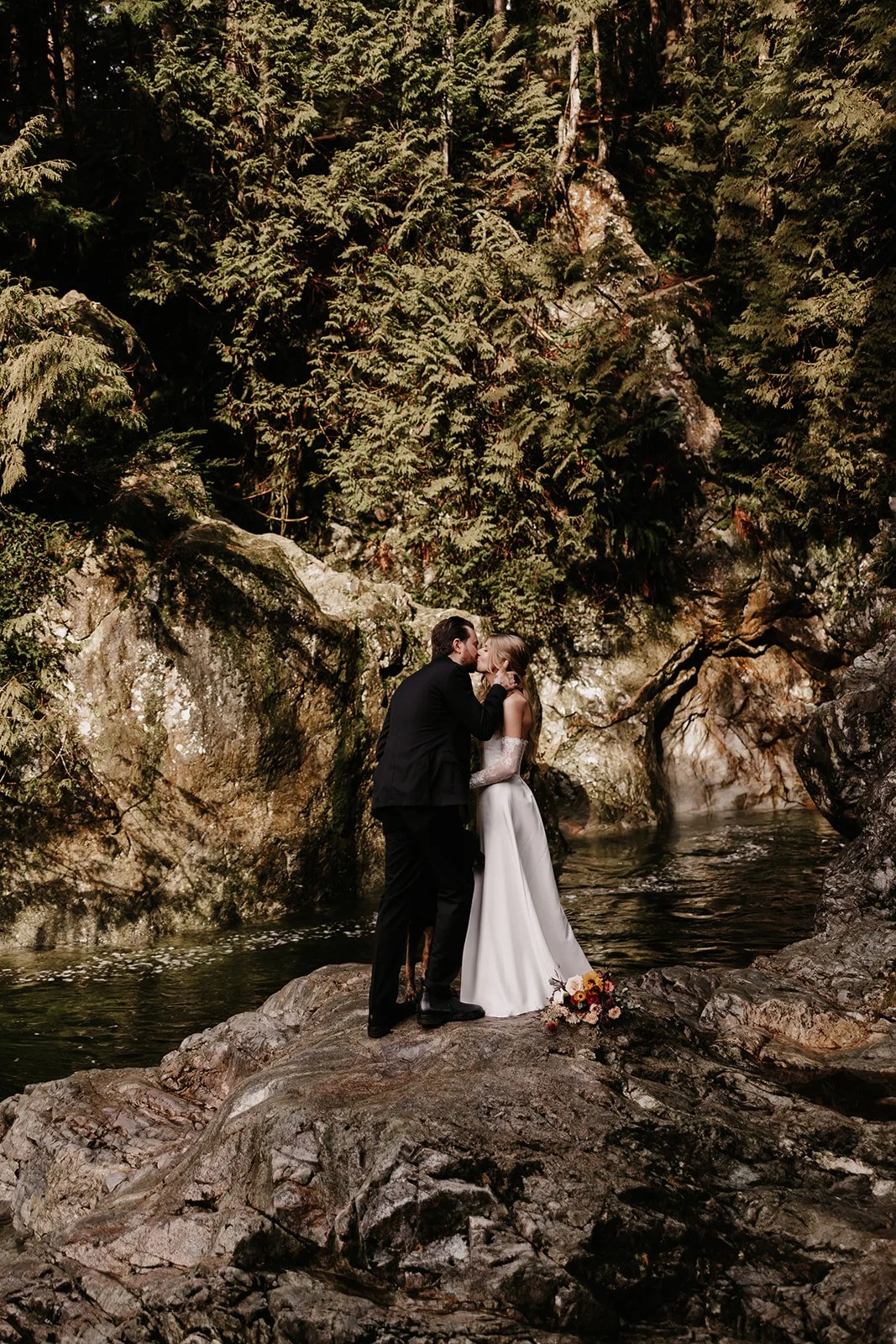 A happy couple eloping in the forest