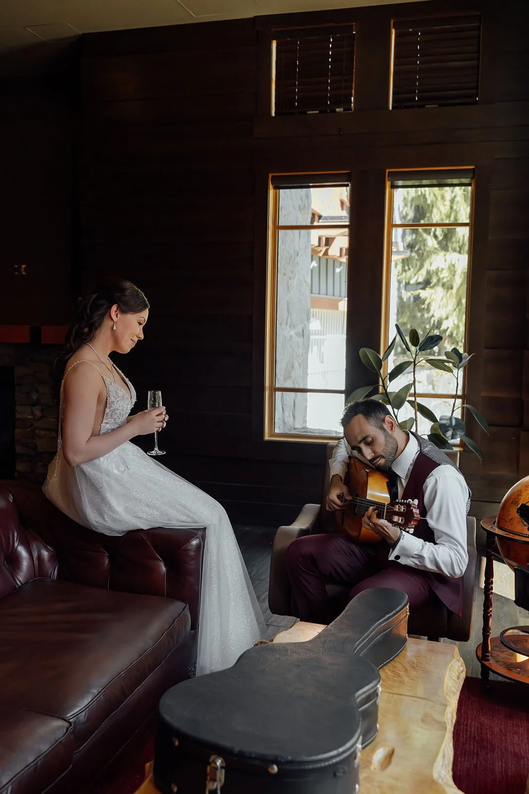 A groom serenading his bride at Nita Lake Lodge