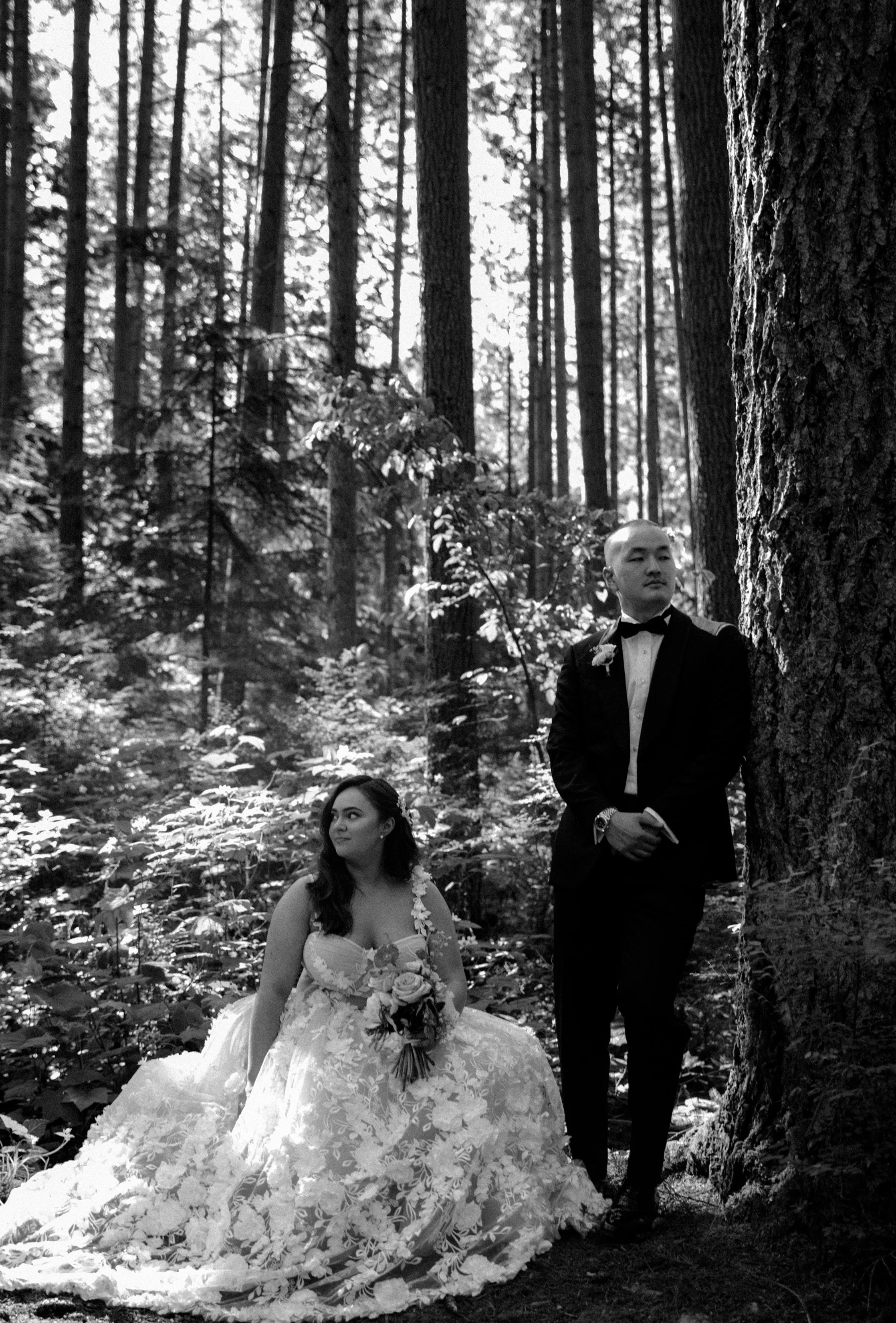 Bride and groom eloping in a serene forest setting