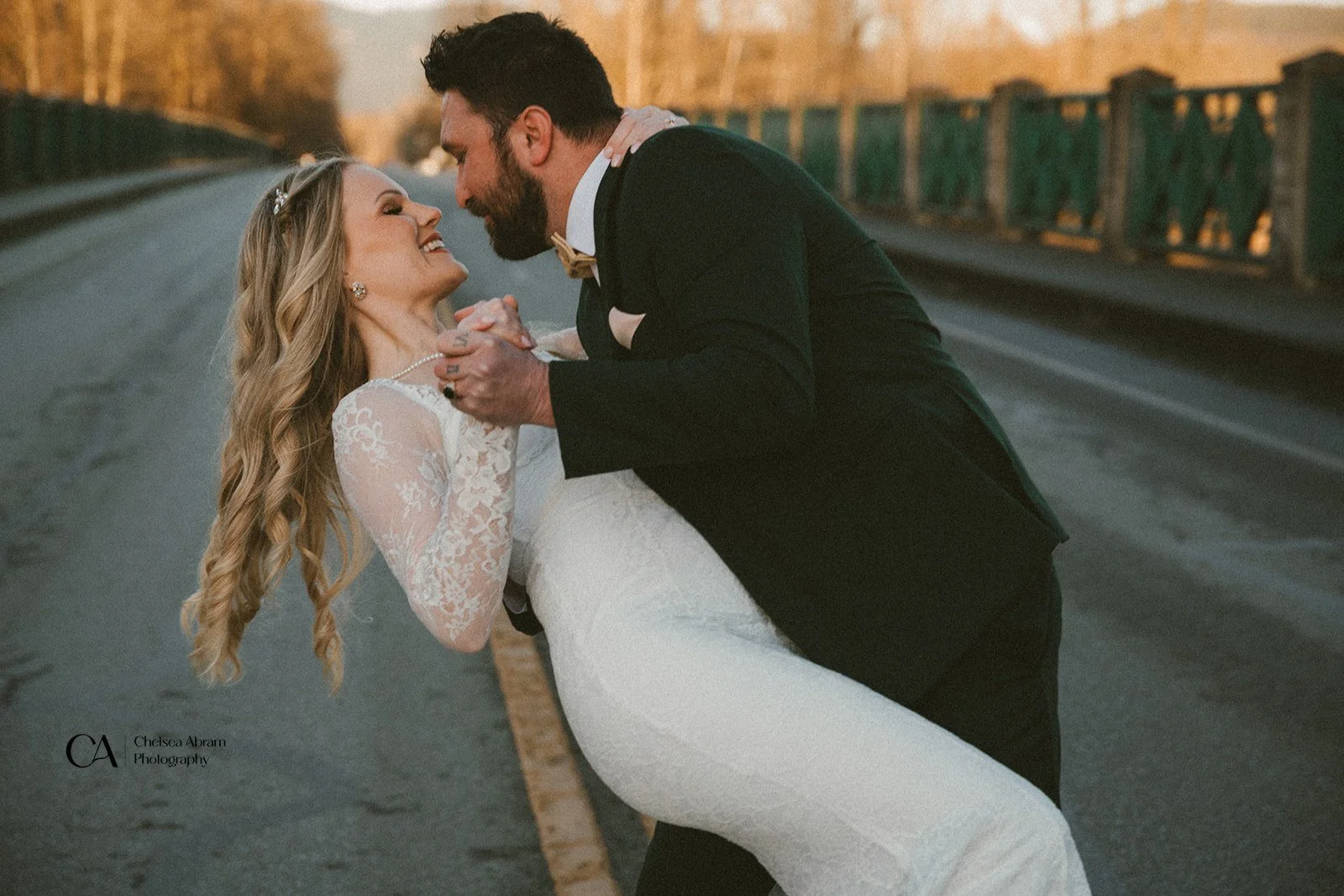A bride and groom dancing outdoors during their elopement