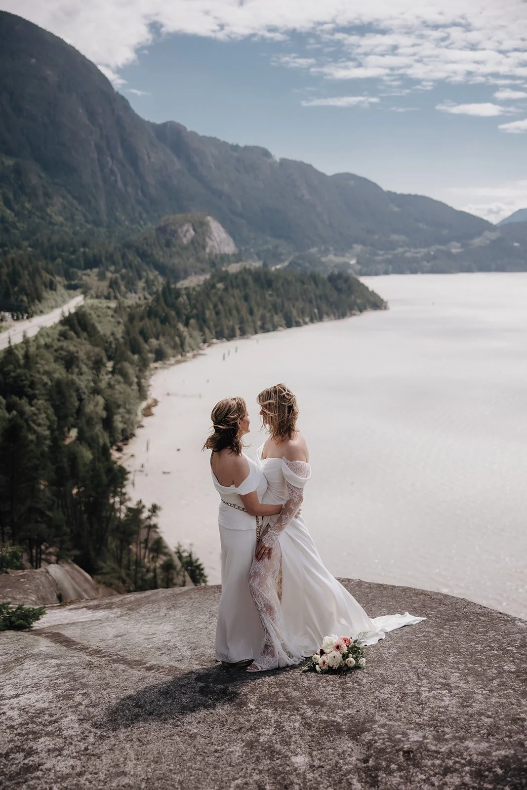A couple eloping, with the beautiful scenery of Squamish, BC in the background.