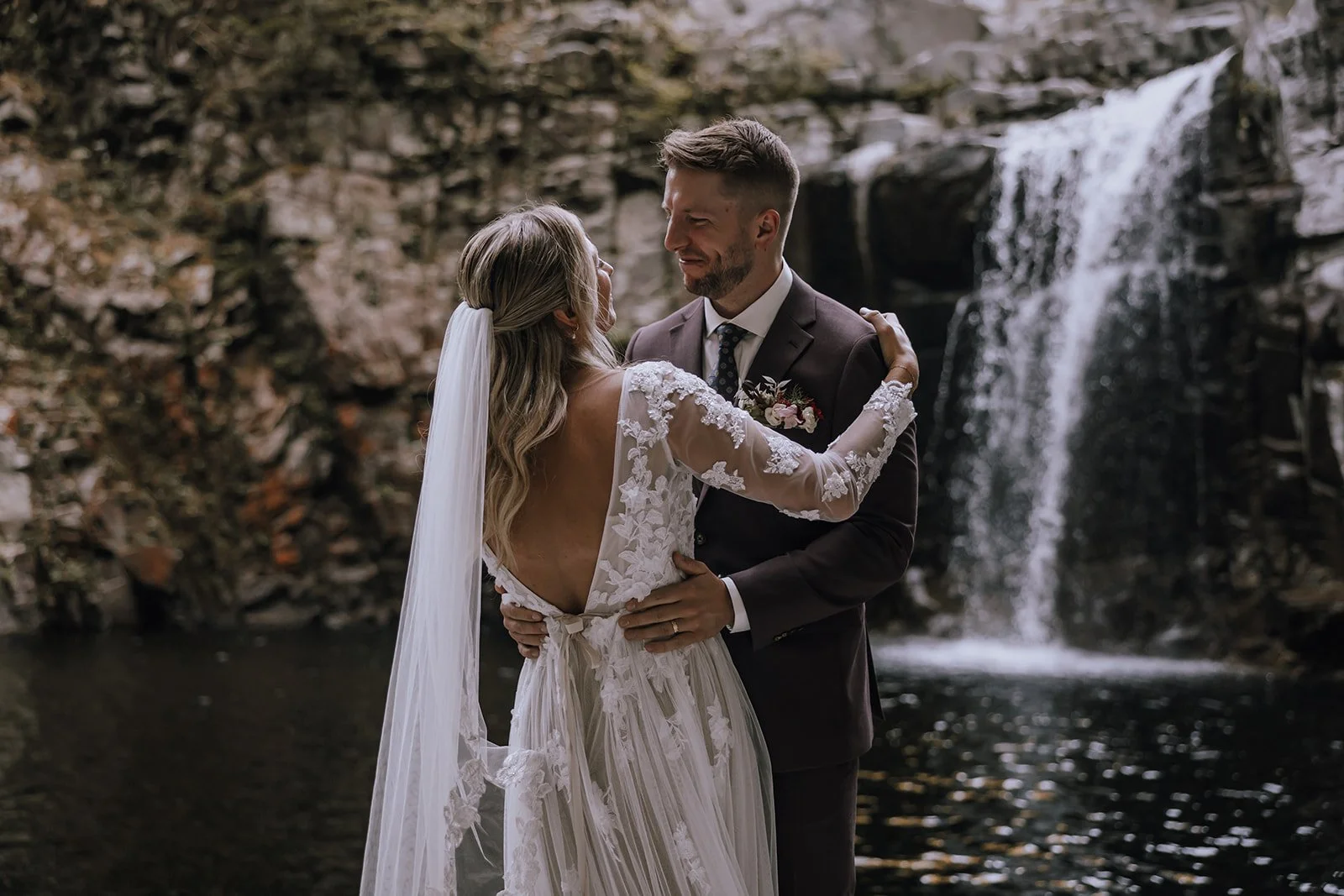 A bride and groom embracing during their elopement