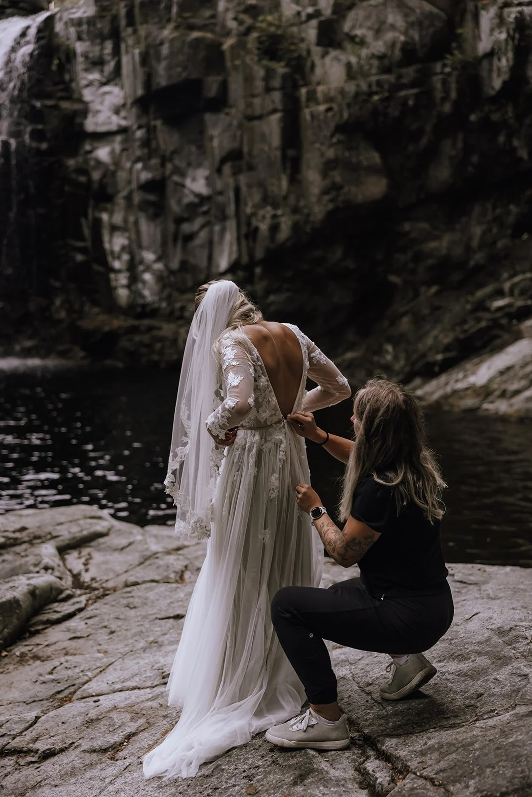A wedding planner helping a bride during their elopement