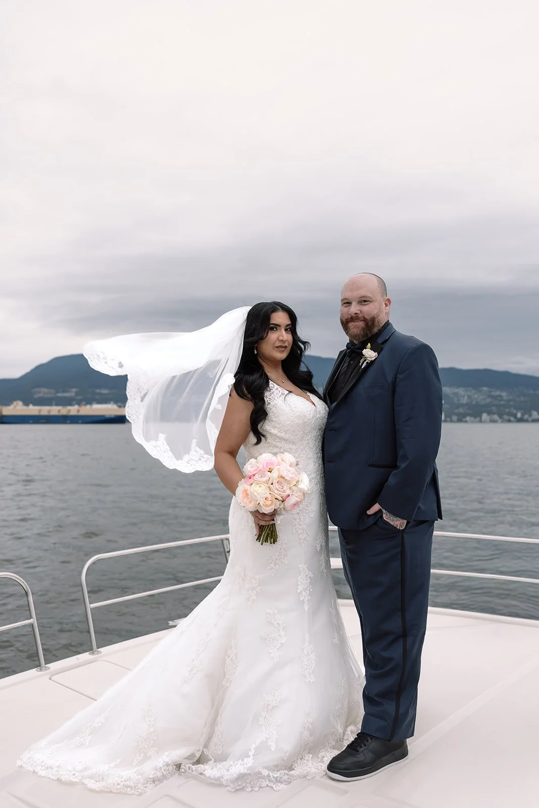 A bride and groom during their yacht elopement in Vancouver, BC