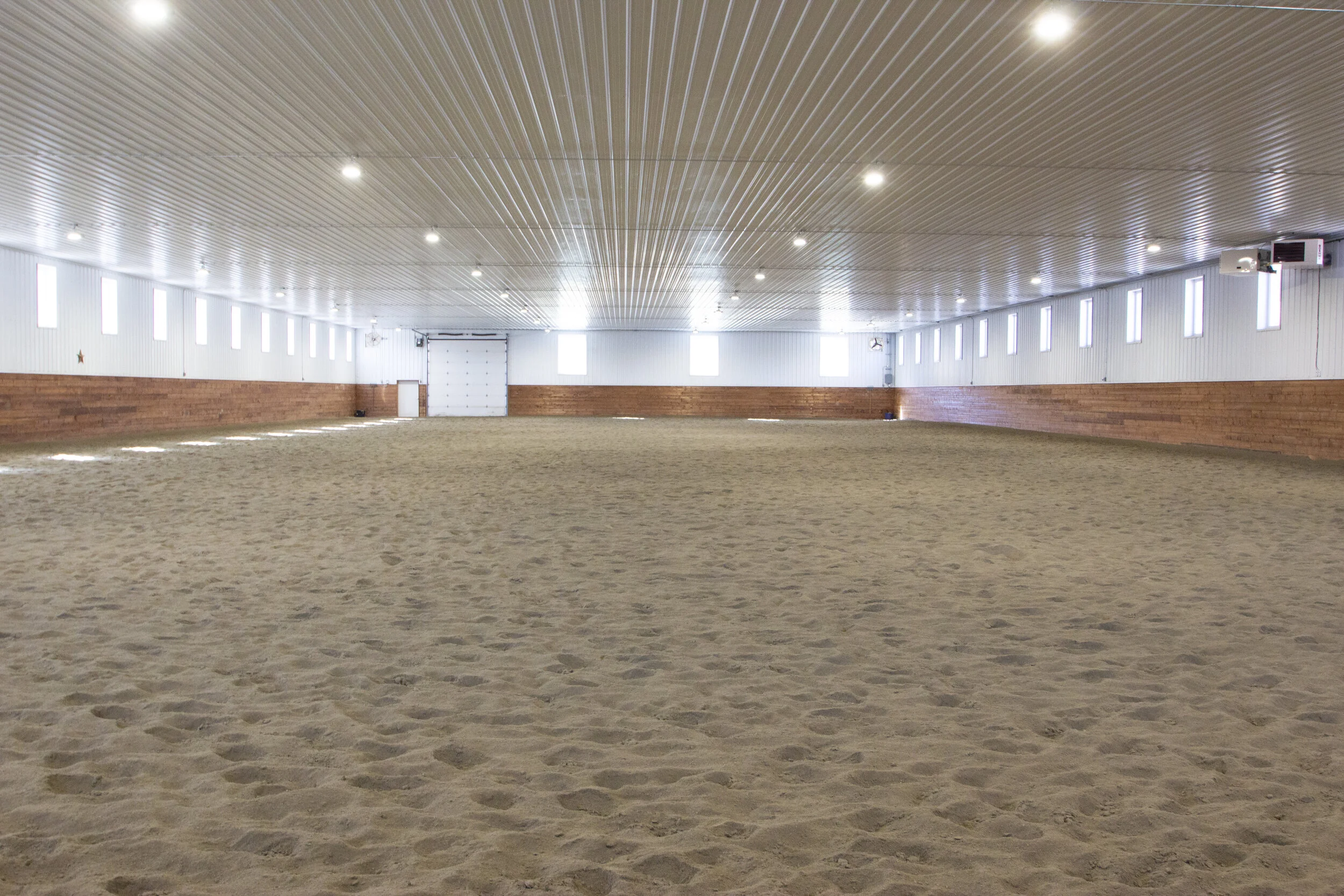 216' x 100' heated indoor arena for year round riding. 