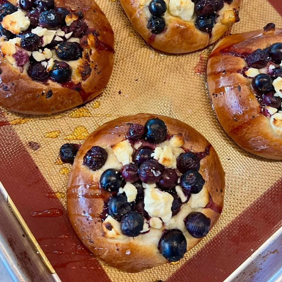 Blueberry, feta and hot honey brioche  danishes are in the case today. It&rsquo;s the perfect combo of sweet, savory and spicy! 🤤Stop in and treat yourself today! We are open 8:45-5:30.