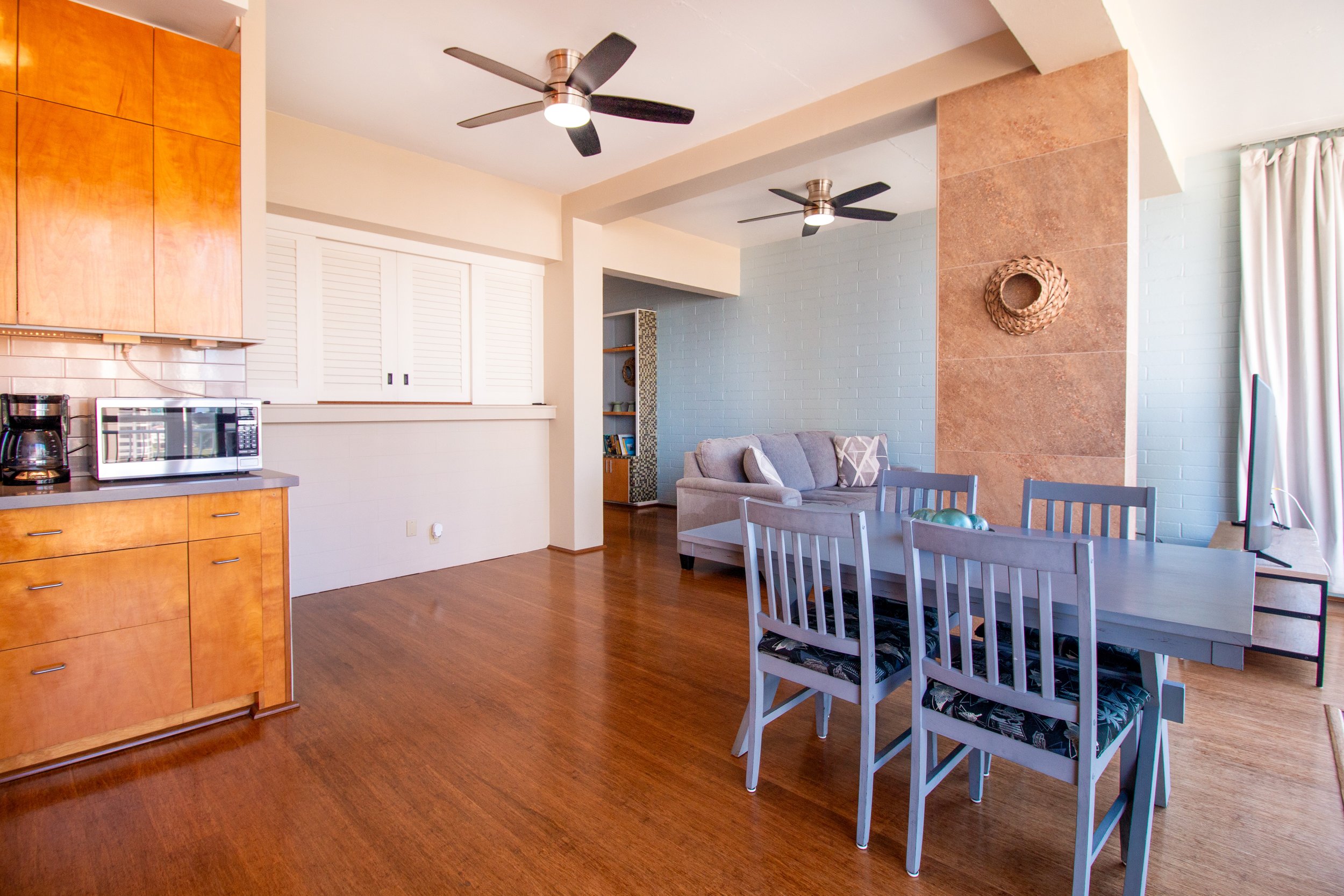 Living and dining area. New ceiling fans installed in spring 2022.