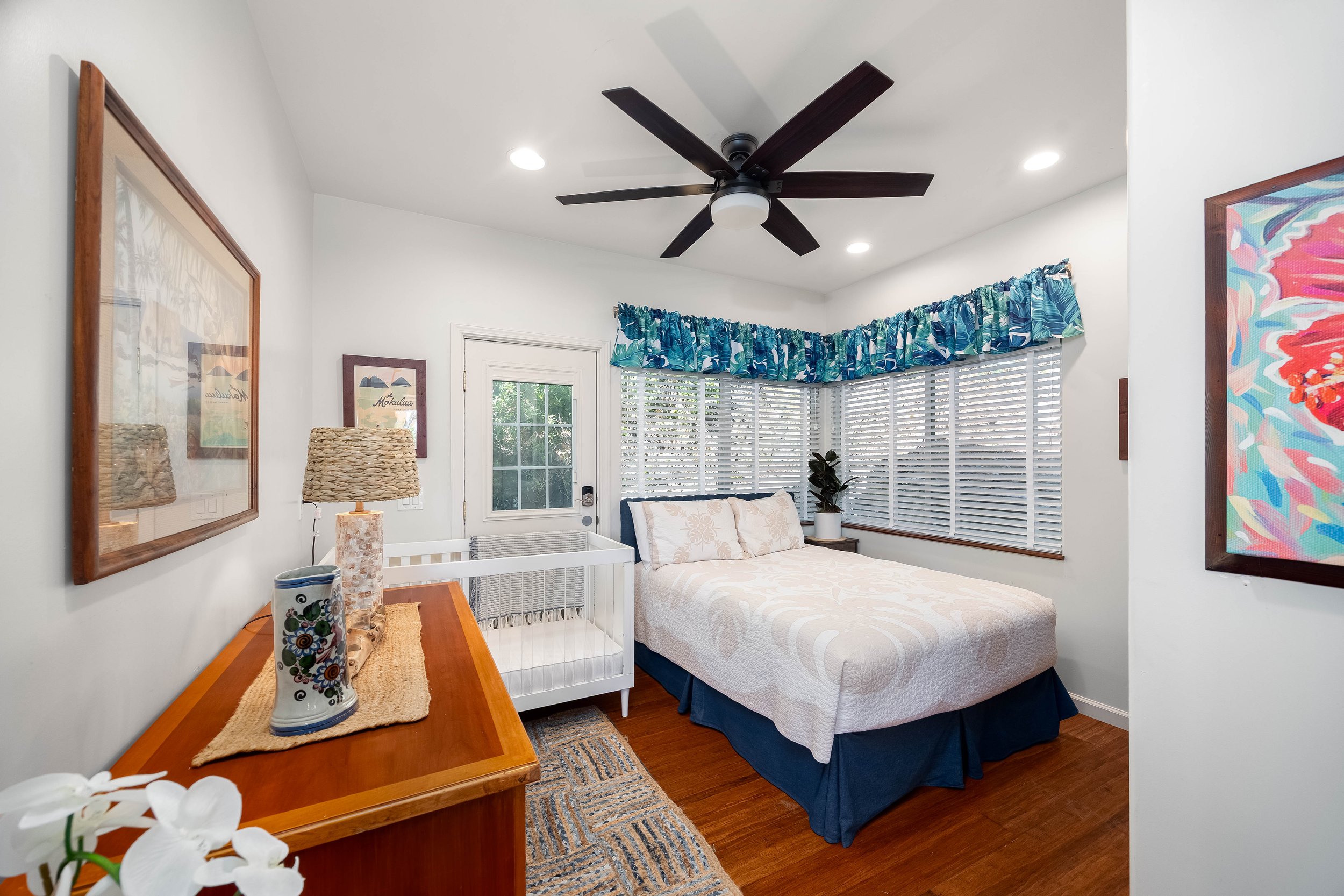 Bedroom #5 on the first floor with access to the outdoor area.