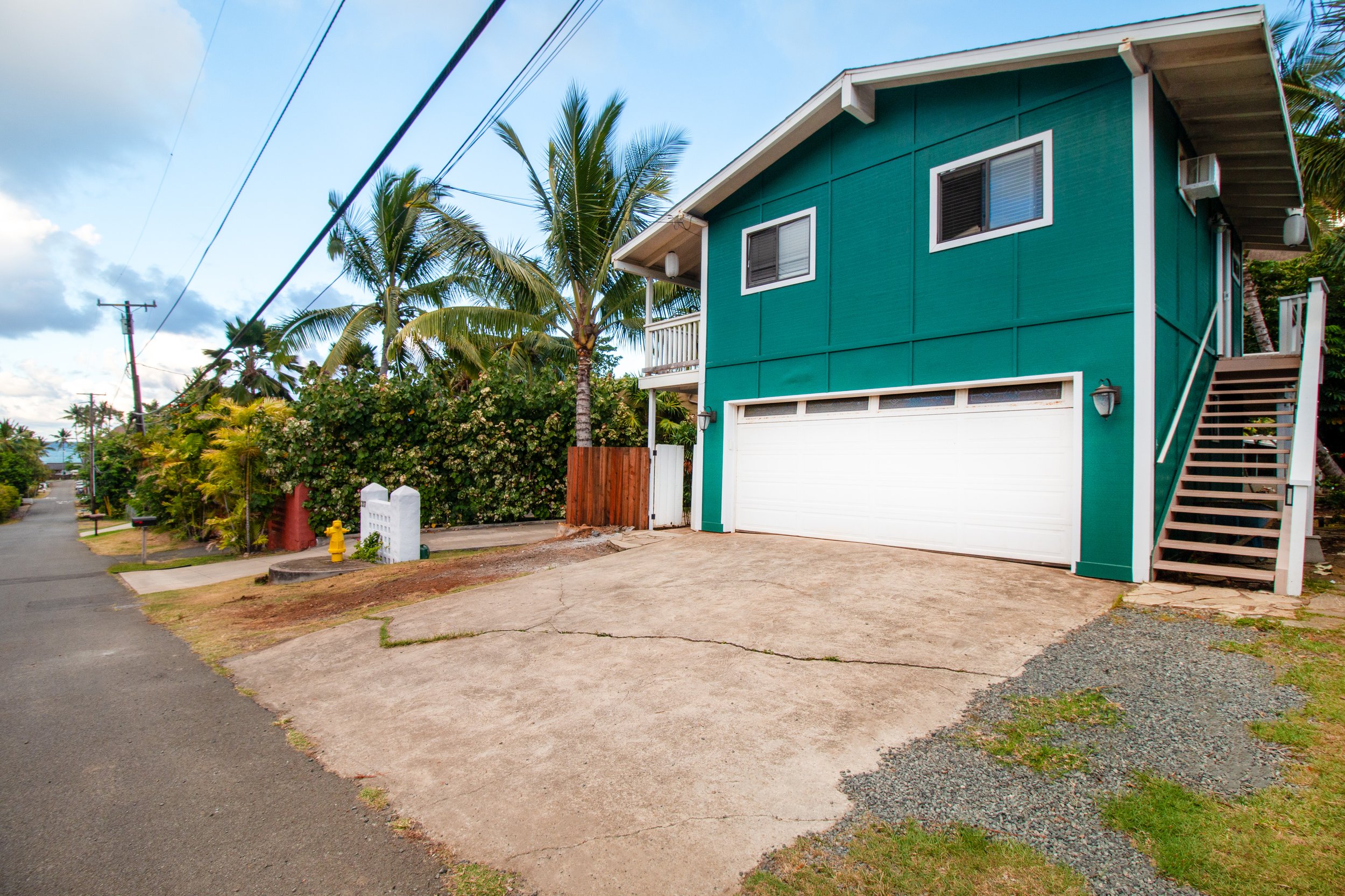 Garage for two cars with a rec room above it