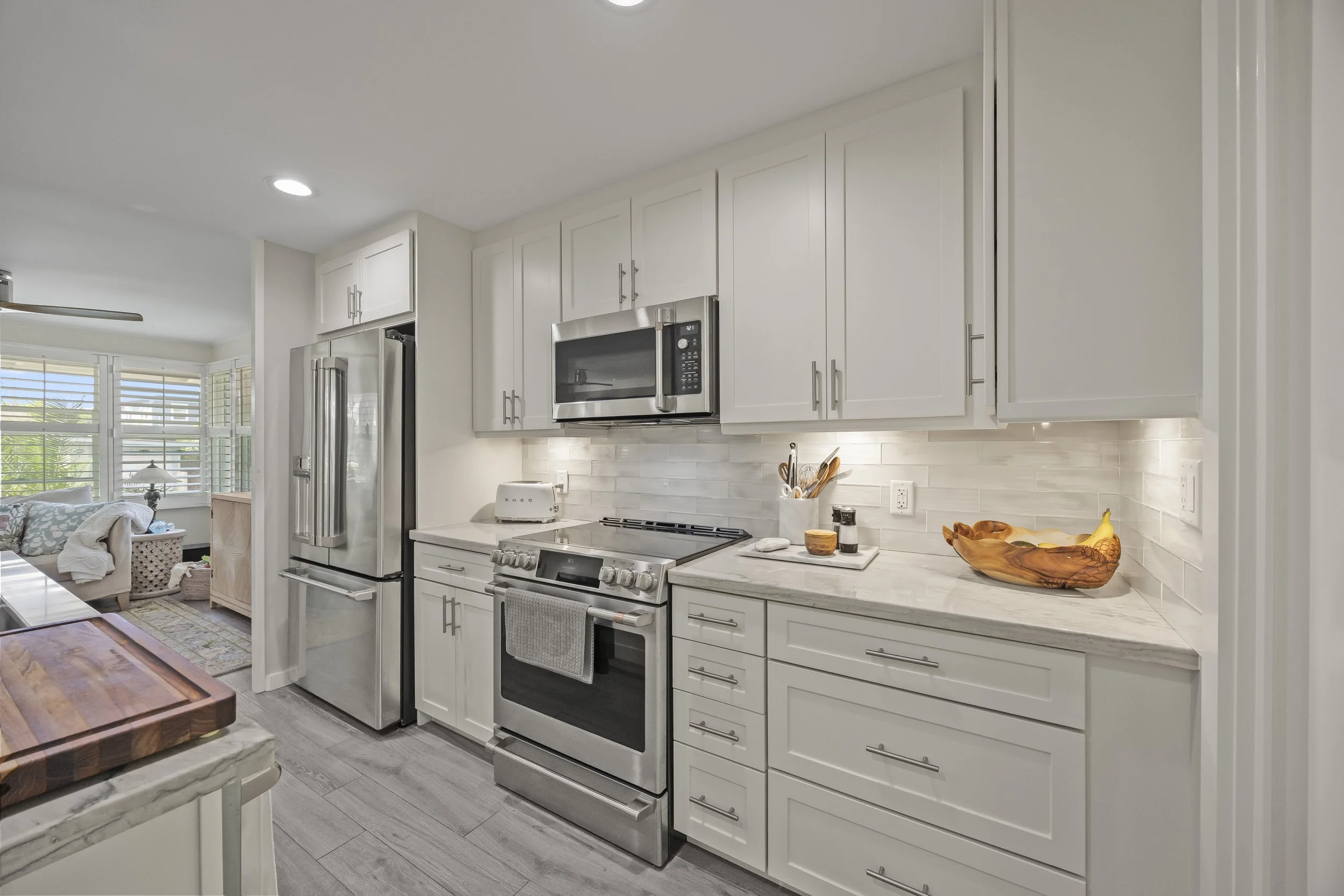 Open kitchen with high-end stainless steel appliances
