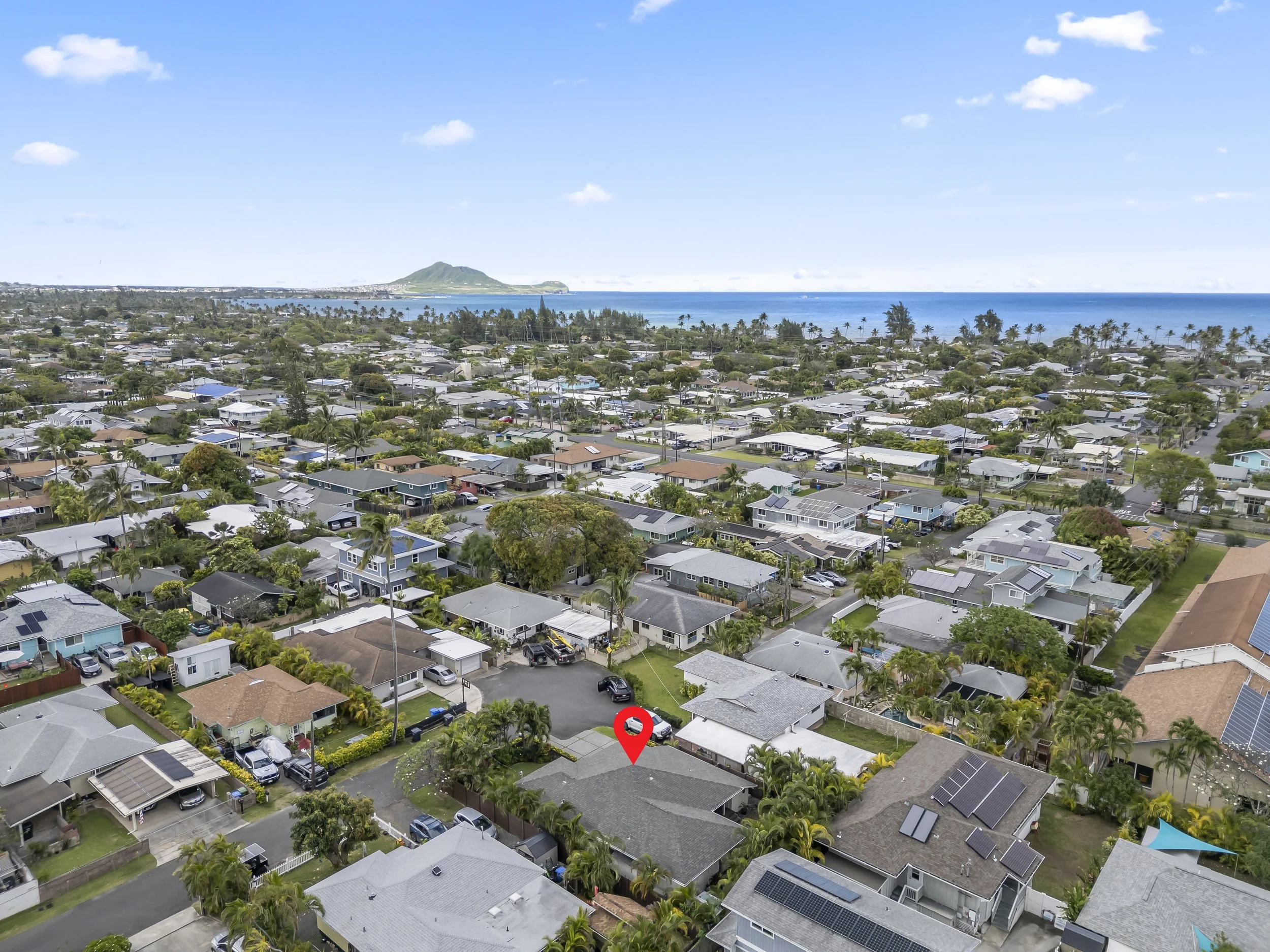 A rare opportunity to own a truly turnkey home in Kailua’s coveted Kalama / Coconut Grove neighborhood