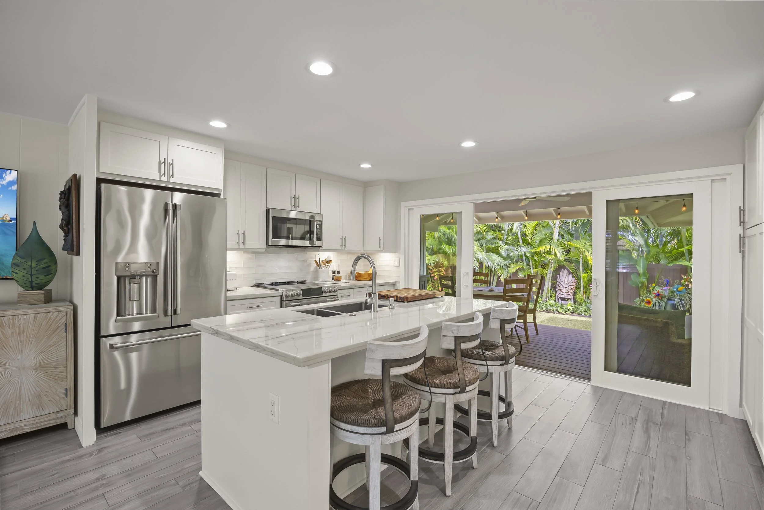 Kitchen with granite countertops with center island and high-end stainless steel appliances