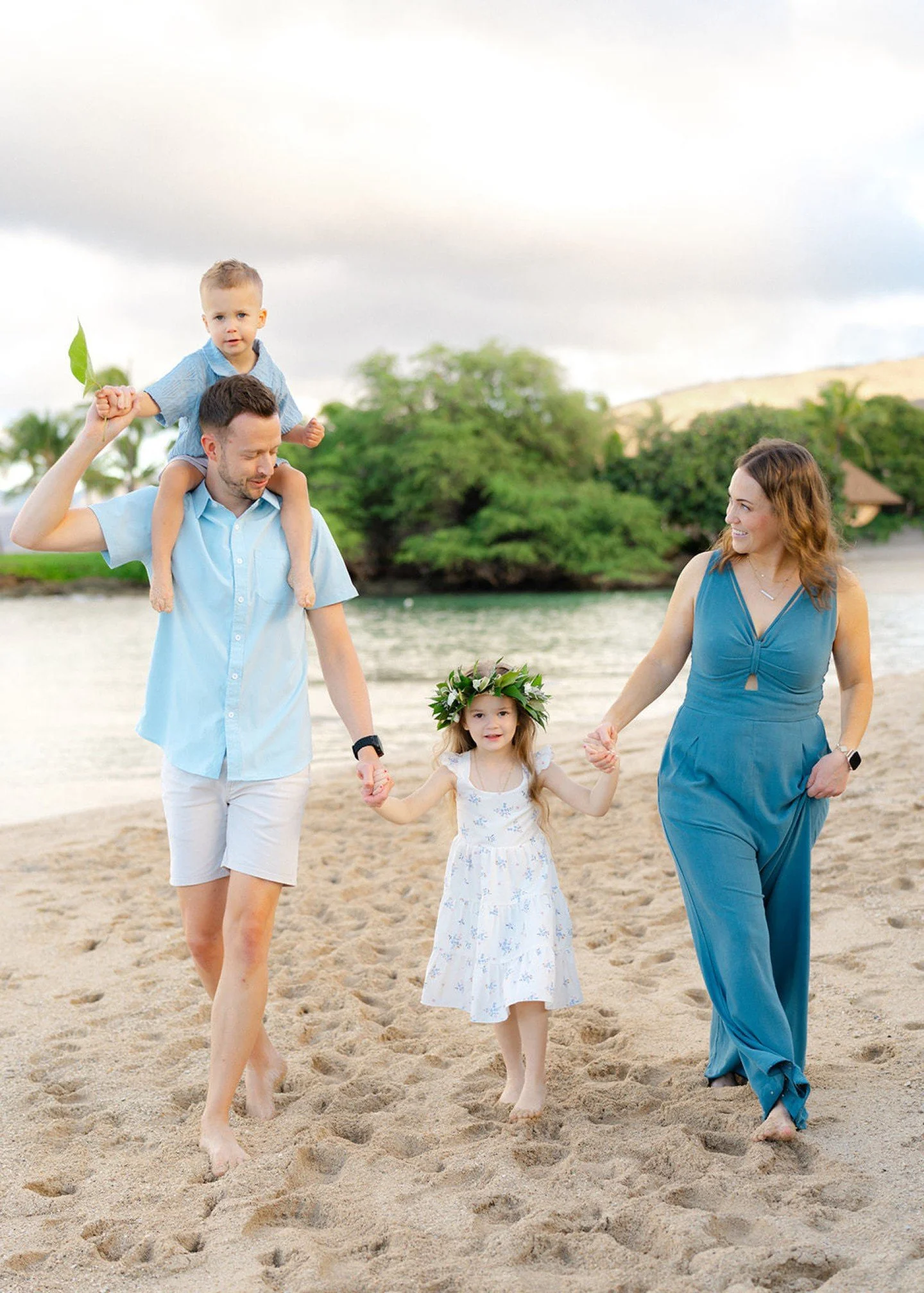 This beautiful family session on the beach totally melted my heart! The kids had the best time playing in the sand, while the whole crew walked hand-in-hand along the shore, just soaking in the moment. I love how the little girl&rsquo;s floral dress 