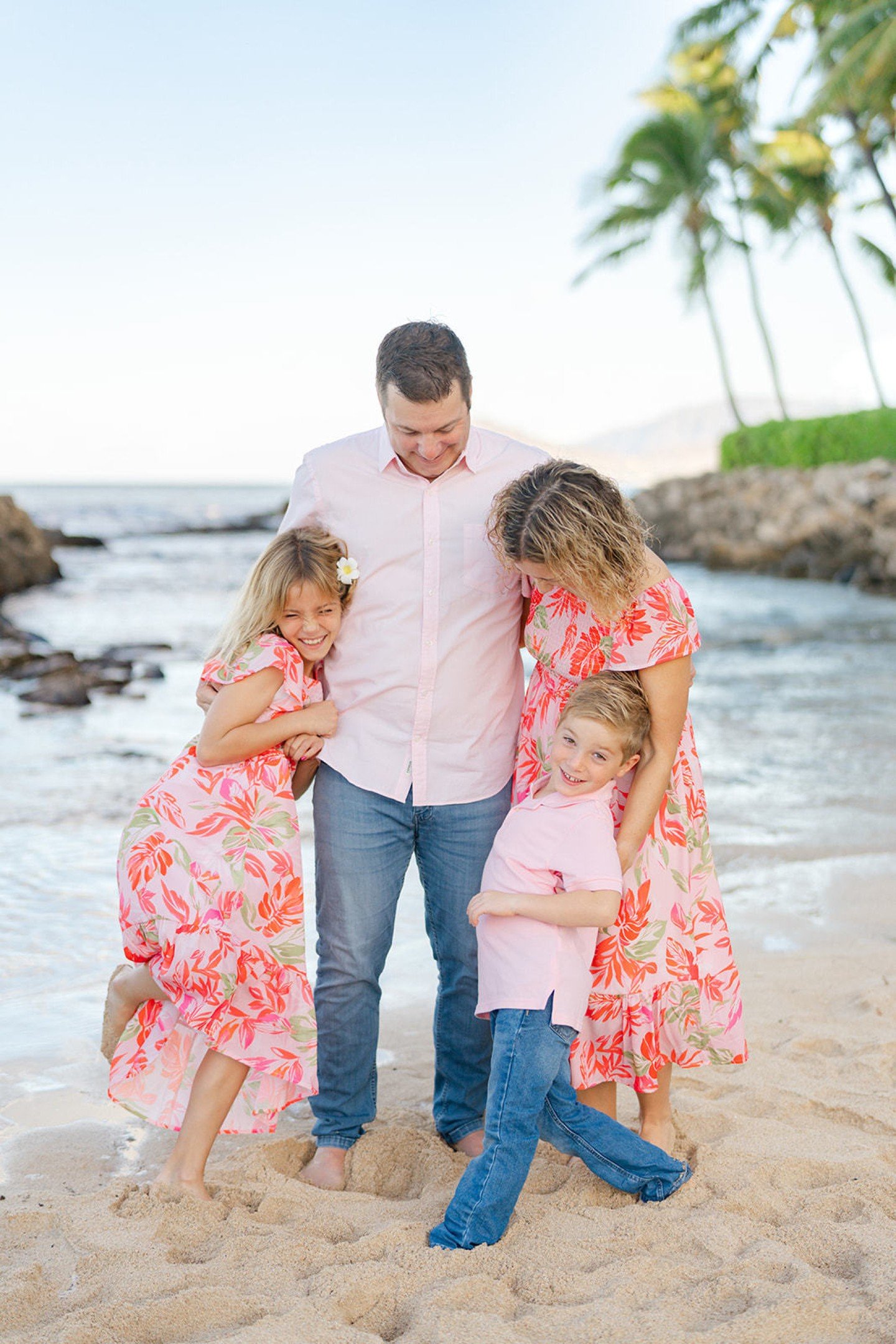 Can we talk about these outfits for a sec? How cute is it that mom and daughter are in matching dresses and dad and son are twinning in their shirts? 🌸 This family just radiates joy. Just look at those smiles! The energy was all about fun and being 
