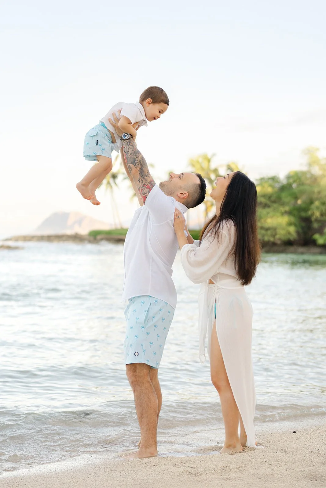 sunrise-family-session-in-oahu-oceanfront-family-photo.jpg
