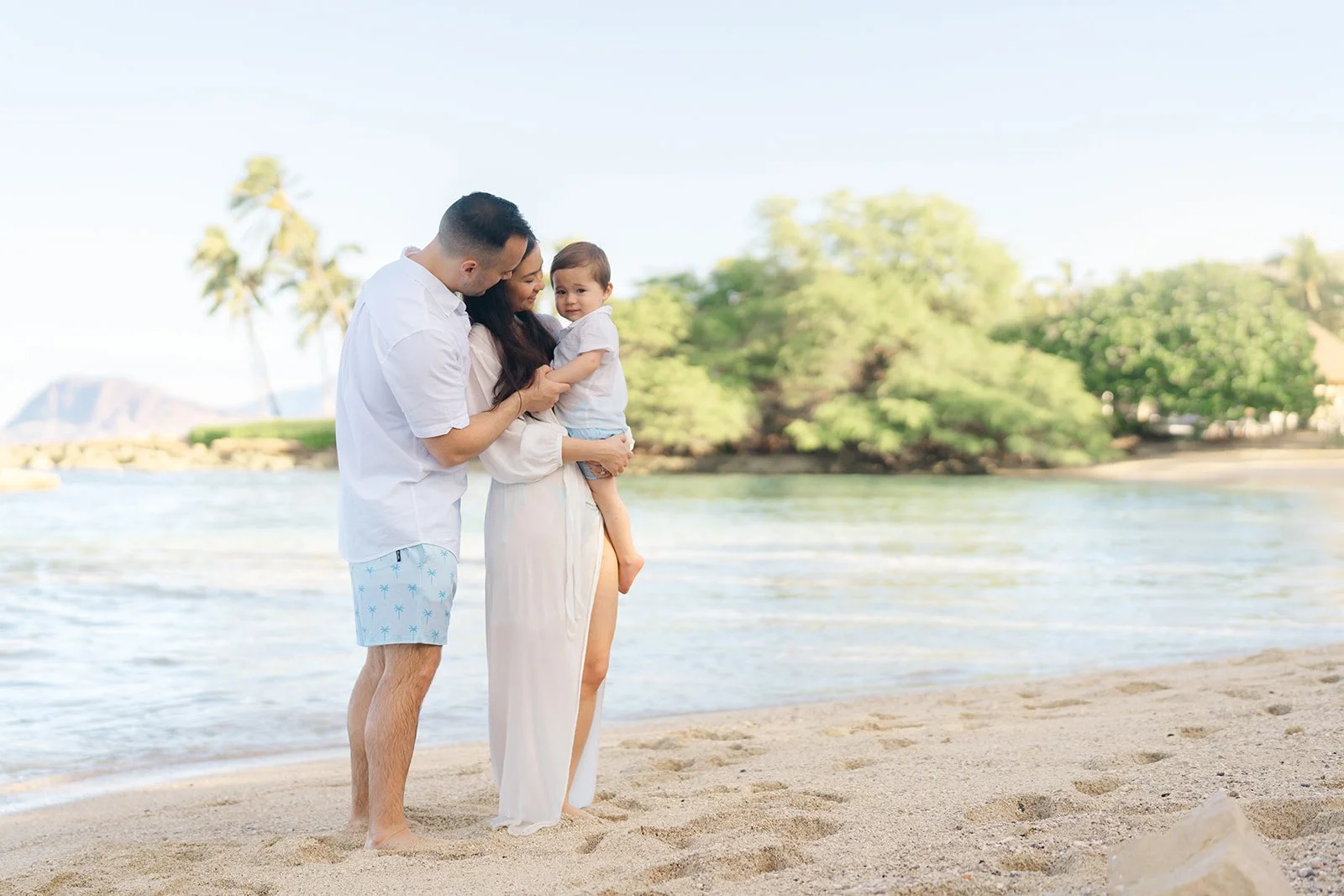 sunrise-family-session-in-oahu-family-walking-on-beach.jpg