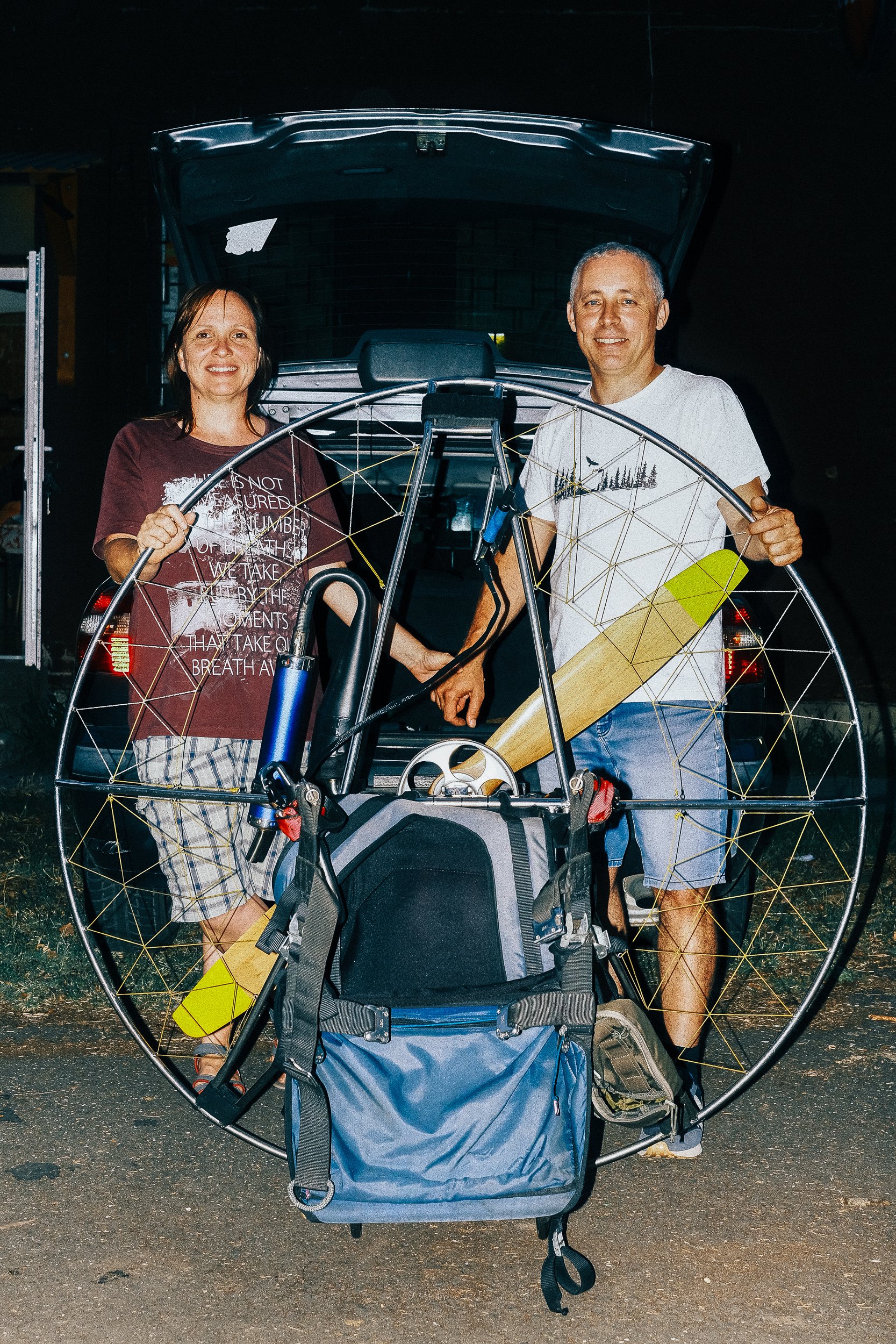 
A couple sets up their hang glider