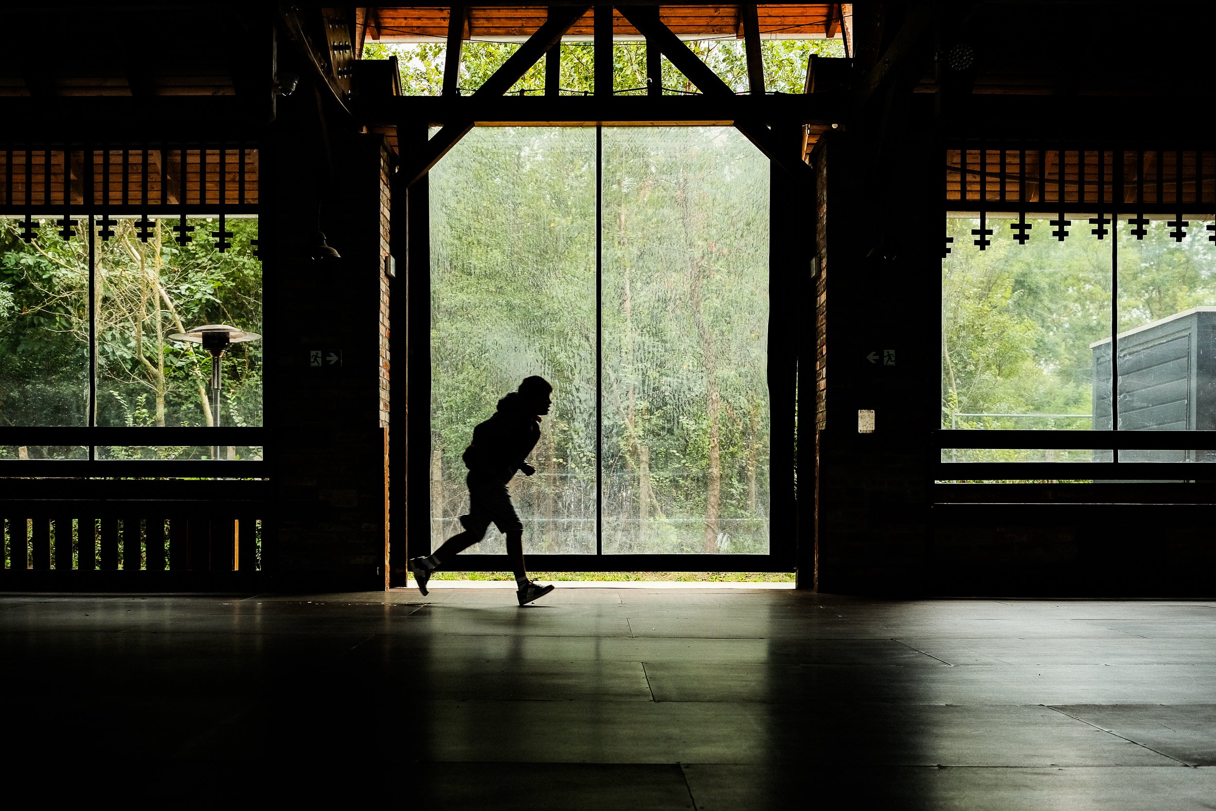 Running in front of a side entrance gate
