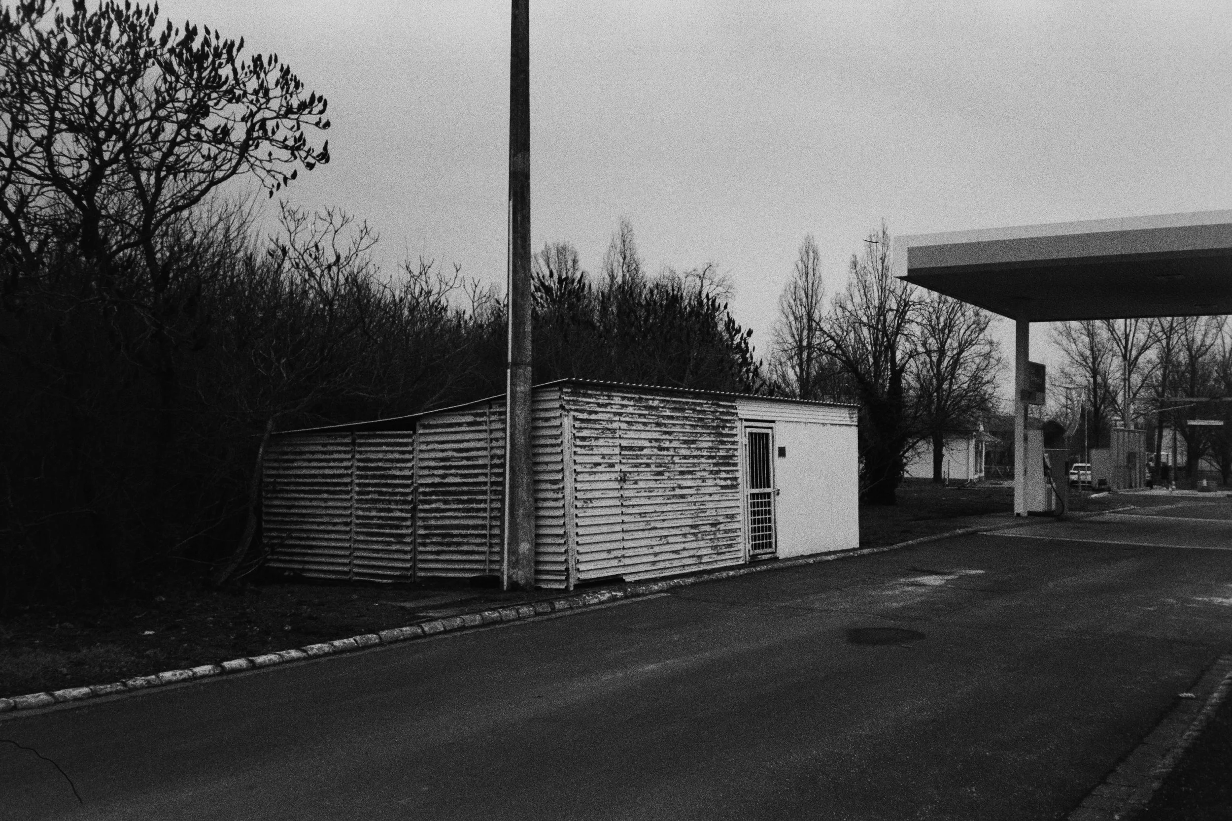 Small shed behind an old gas station. 2026.