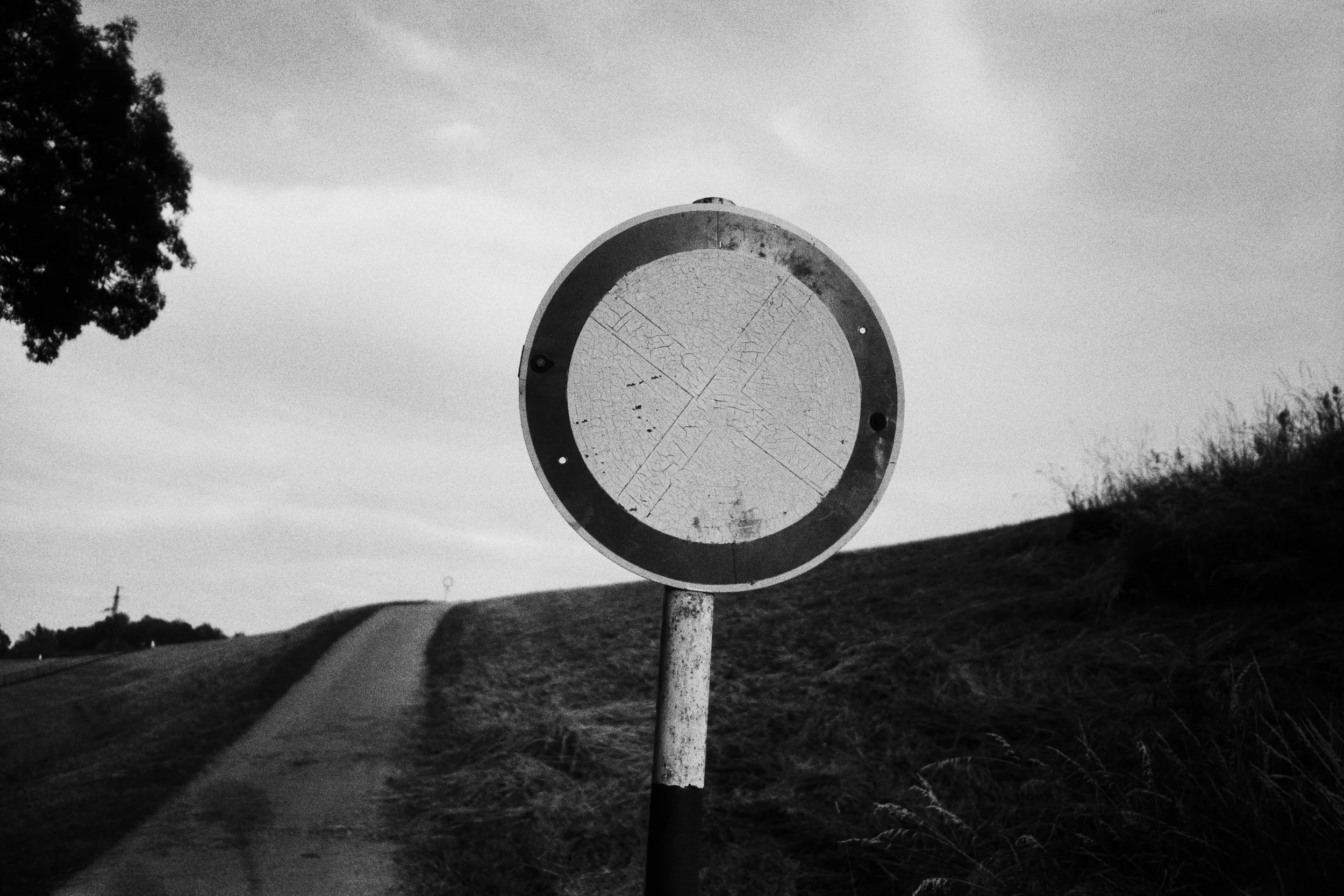 A traffic sign that was once a no-stop sign has long since become a no-entry sign. 2026.
