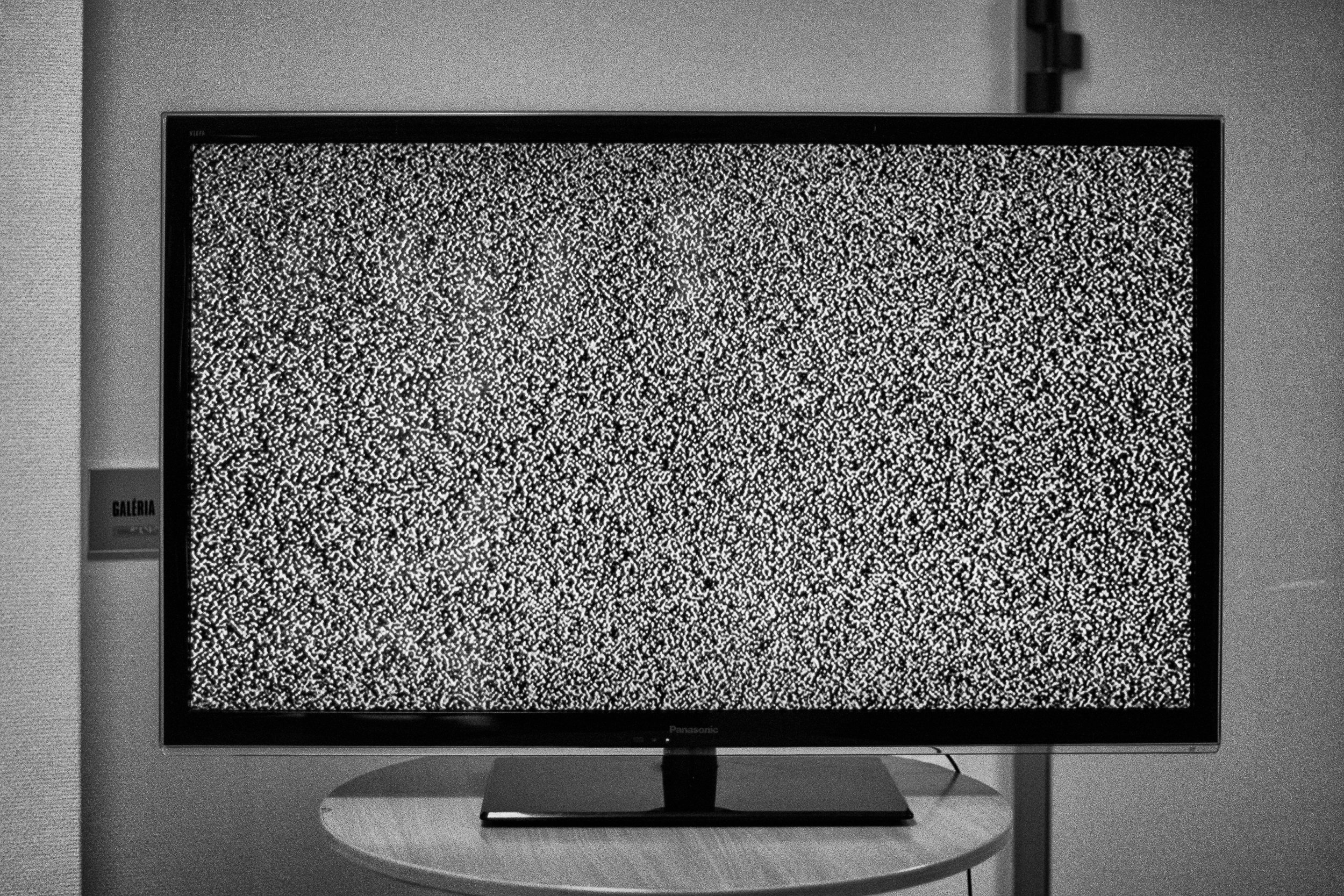 The television is temporarily not broadcasting anything at an exhibition at a local cultural center. 2025.