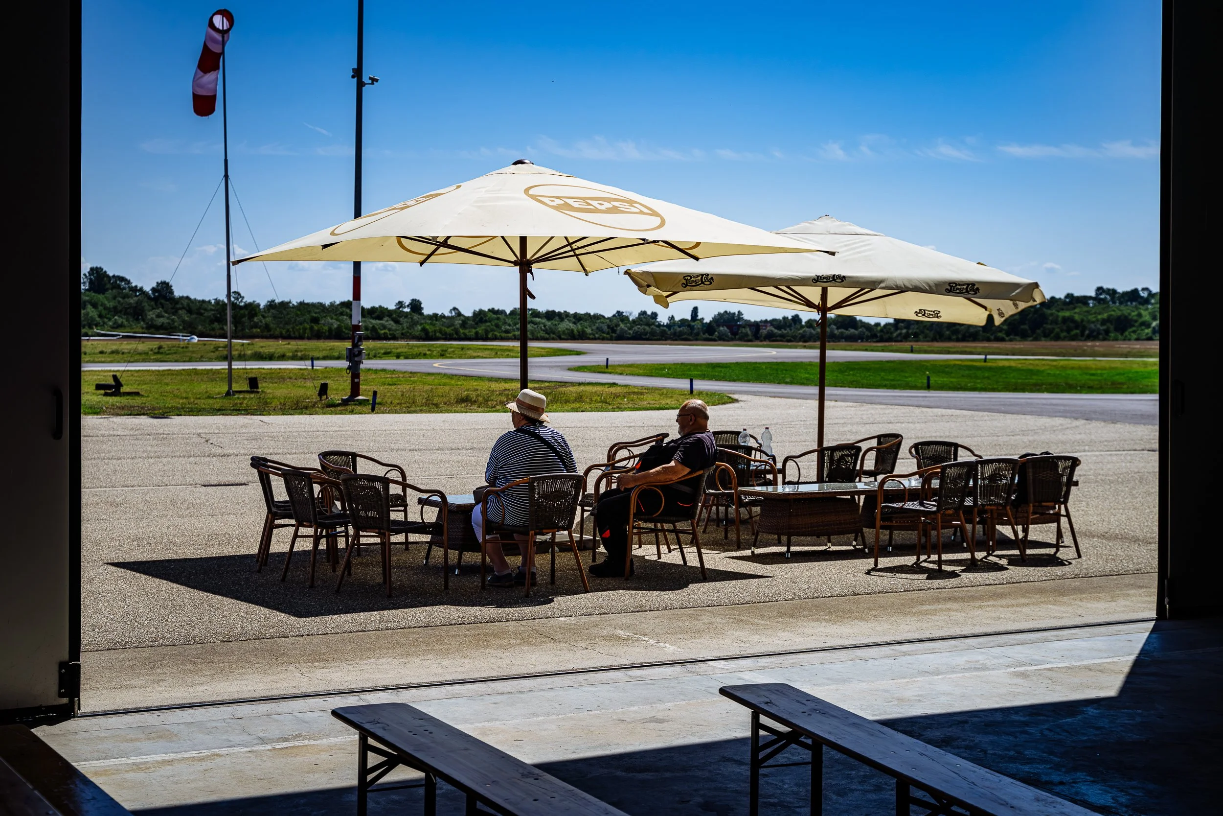 Elderly couple watching a glider race