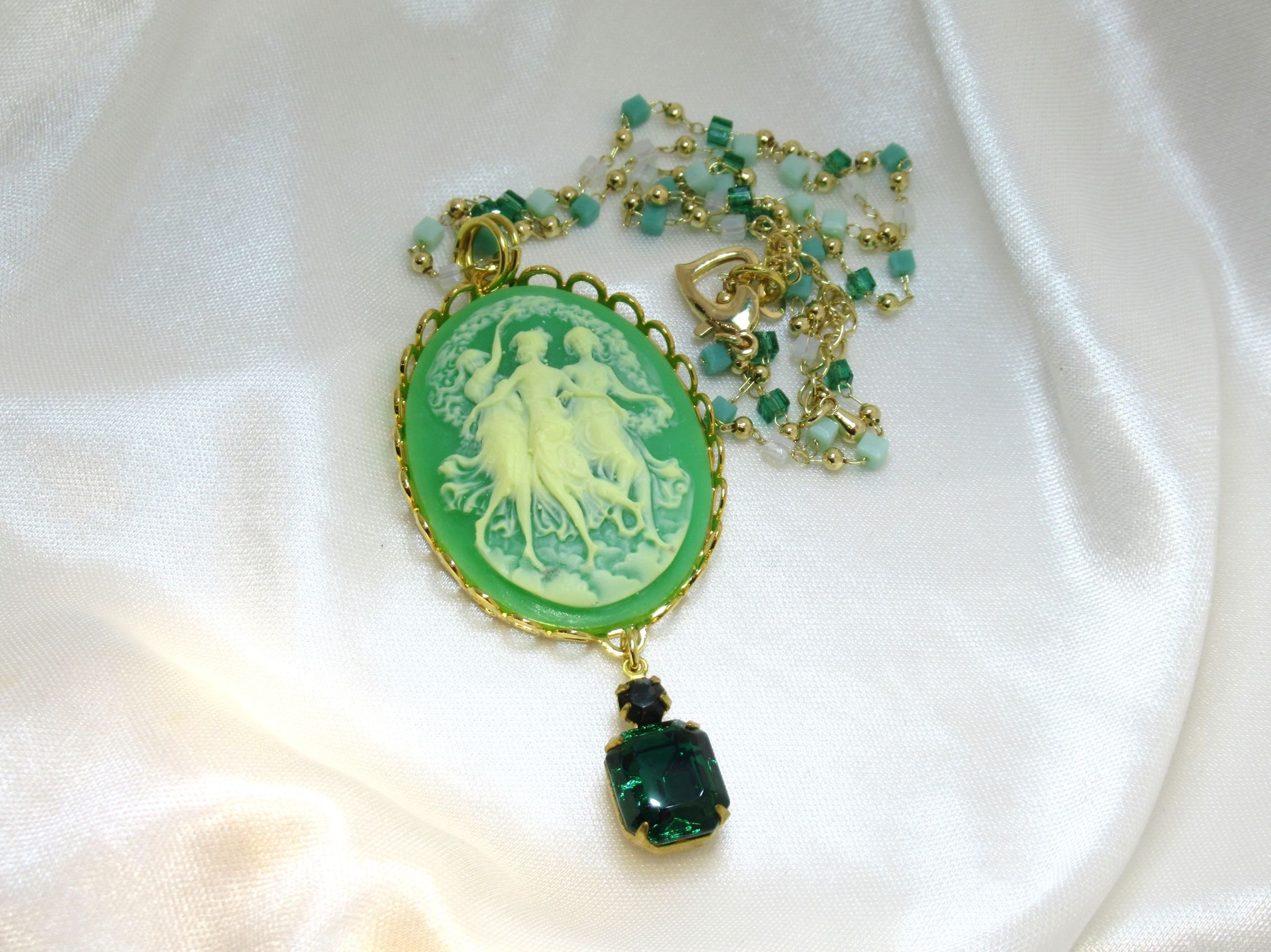 Rosies Vintage and Nik Naks Handcrafted Vintage Kelly Green Cameo Necklace – Three Muses Gold-Plated Crystal Pendant