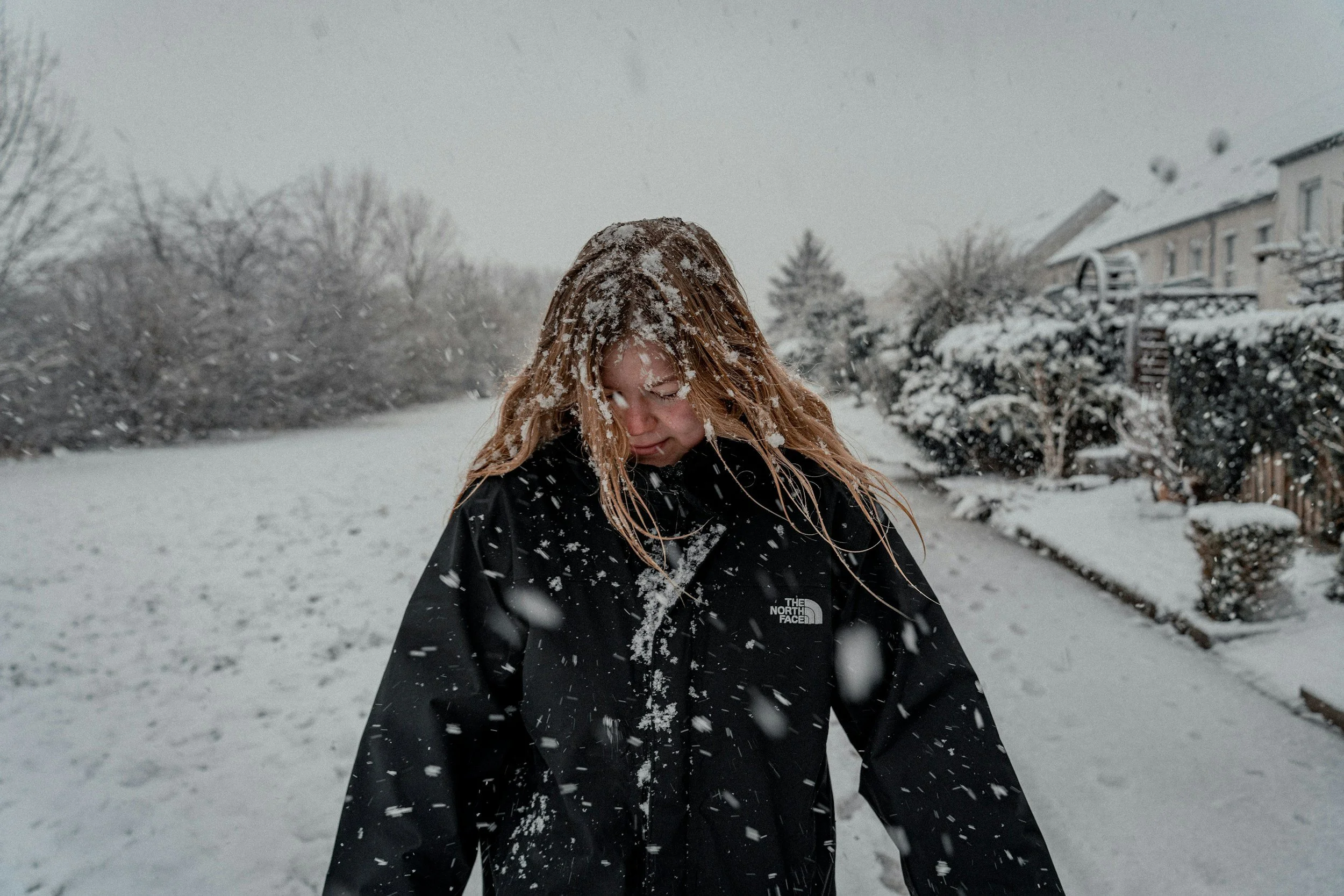 Woman walking alone in the snow symbolizing emotional isolation and self-reflection often experienced by adults exploring whether their challenges relate to autism or borderline personality disorder.