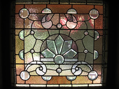 A stained glass window from the mansion.