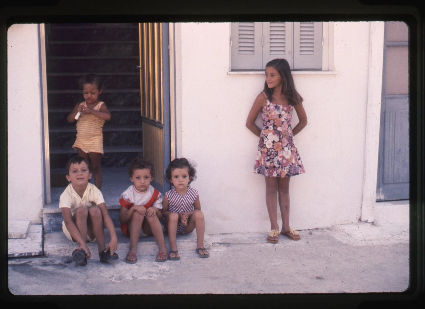 Mirsini with children from the village (1975). Photograph by Jack Whitten.